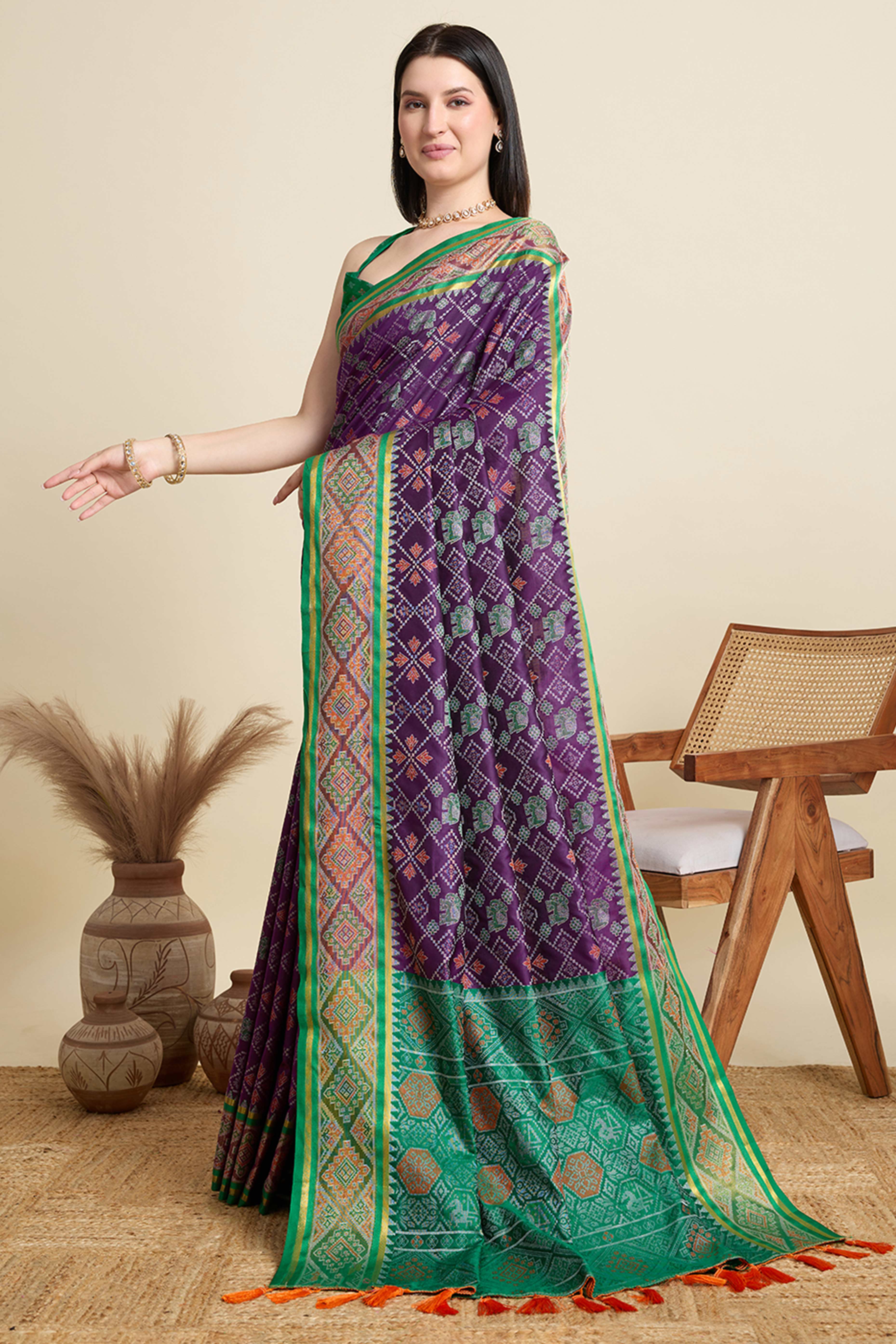 Purple Silk Blend Saree Featuring Patola Prints and a Detailed Weaving Border
