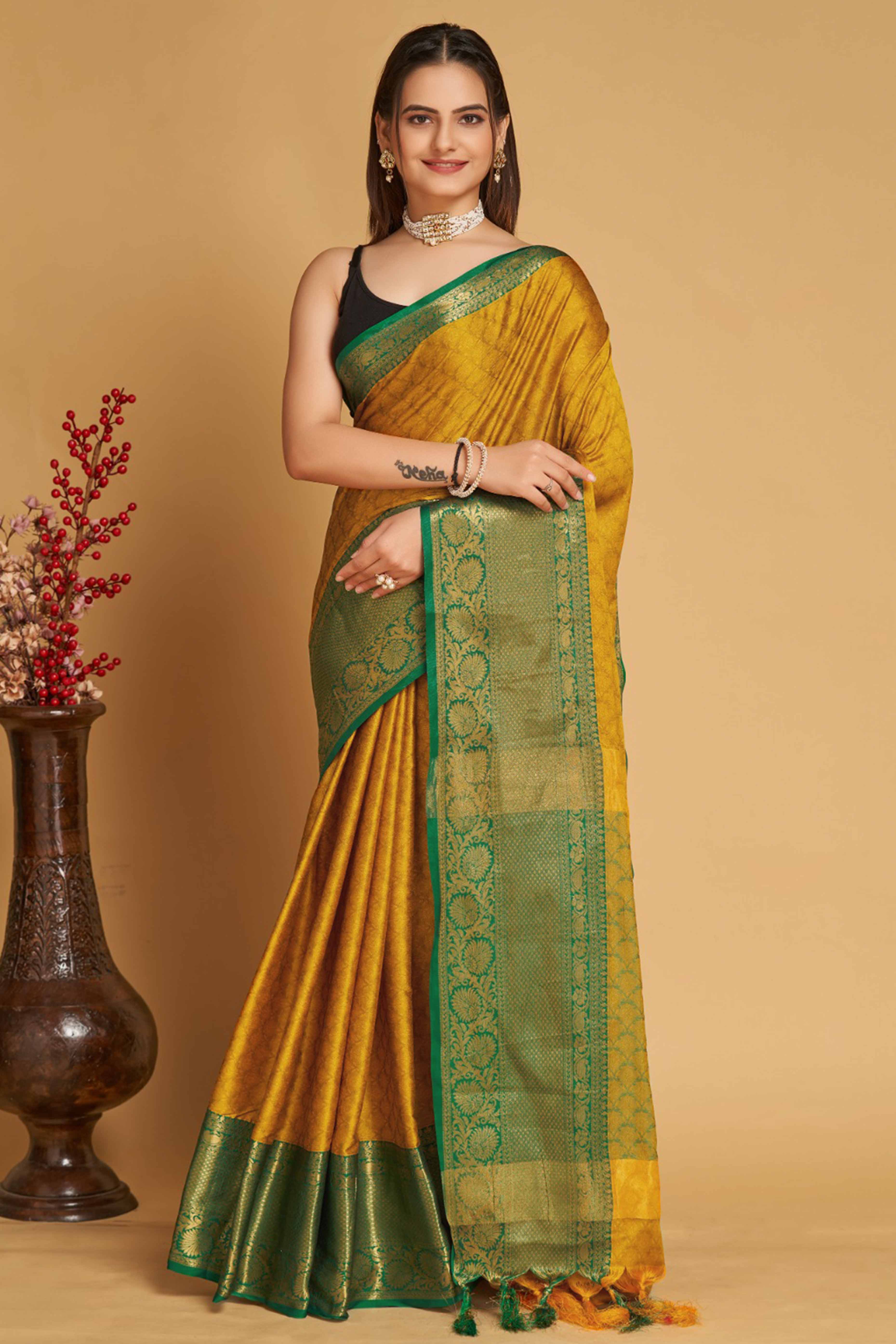Mustard Silk Blend Saree With Detailed Zari Weaving & Tassel Embellishments