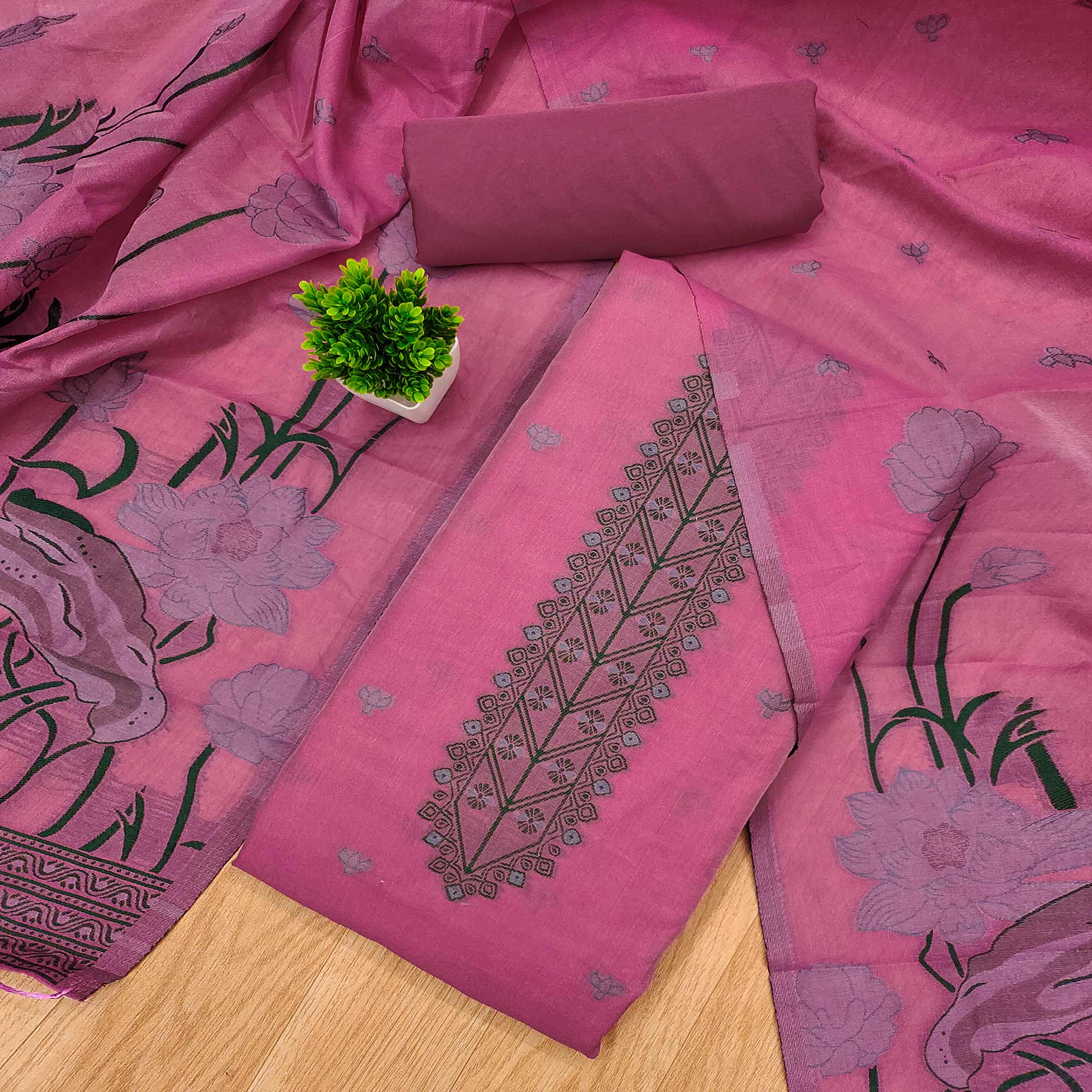 Pink Ethnic Dress Material Showcasing Handloom Style Floral Zari Weaving