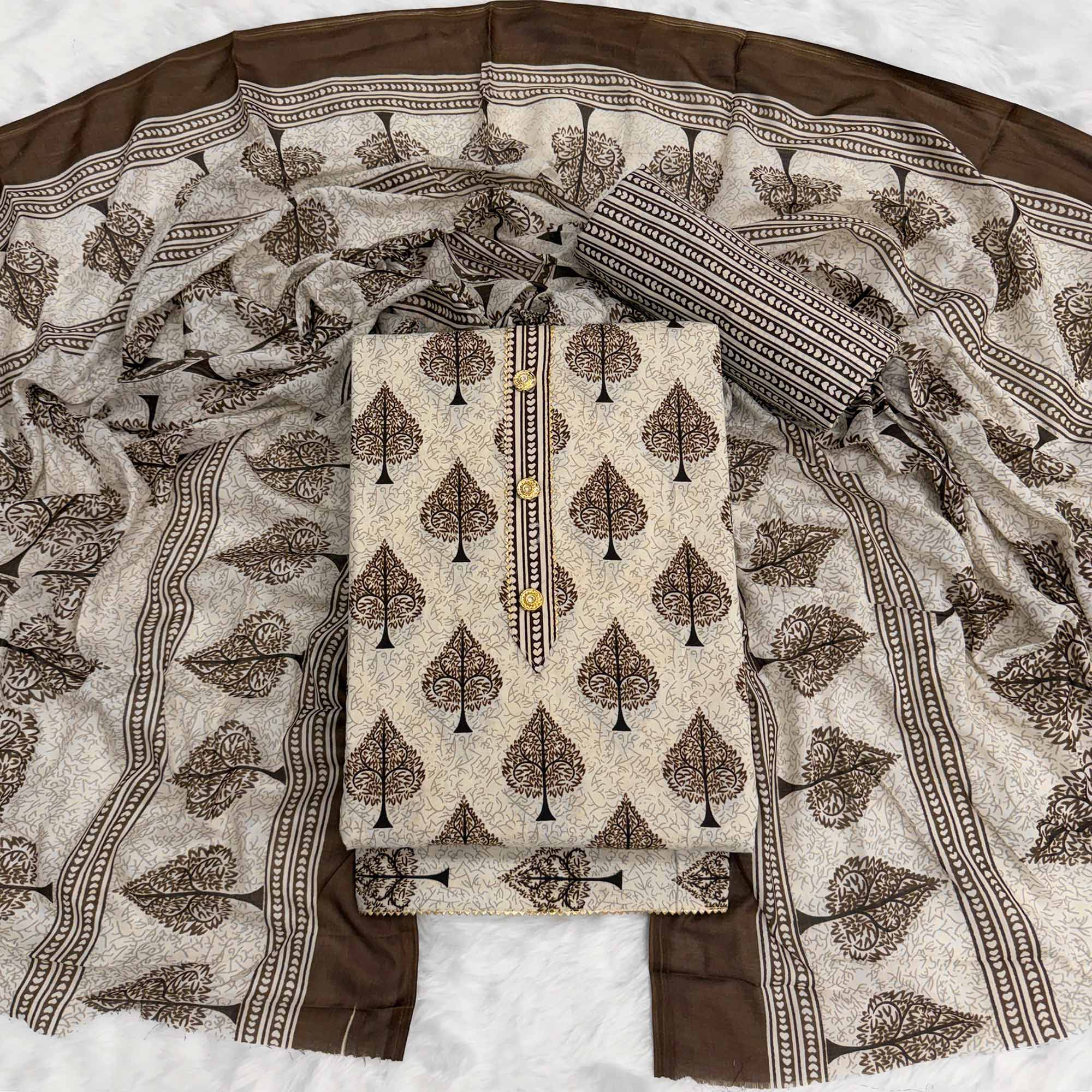 Vibrant Brown Leaf Printed Cotton Blend Dress Material Refined With Lace Border