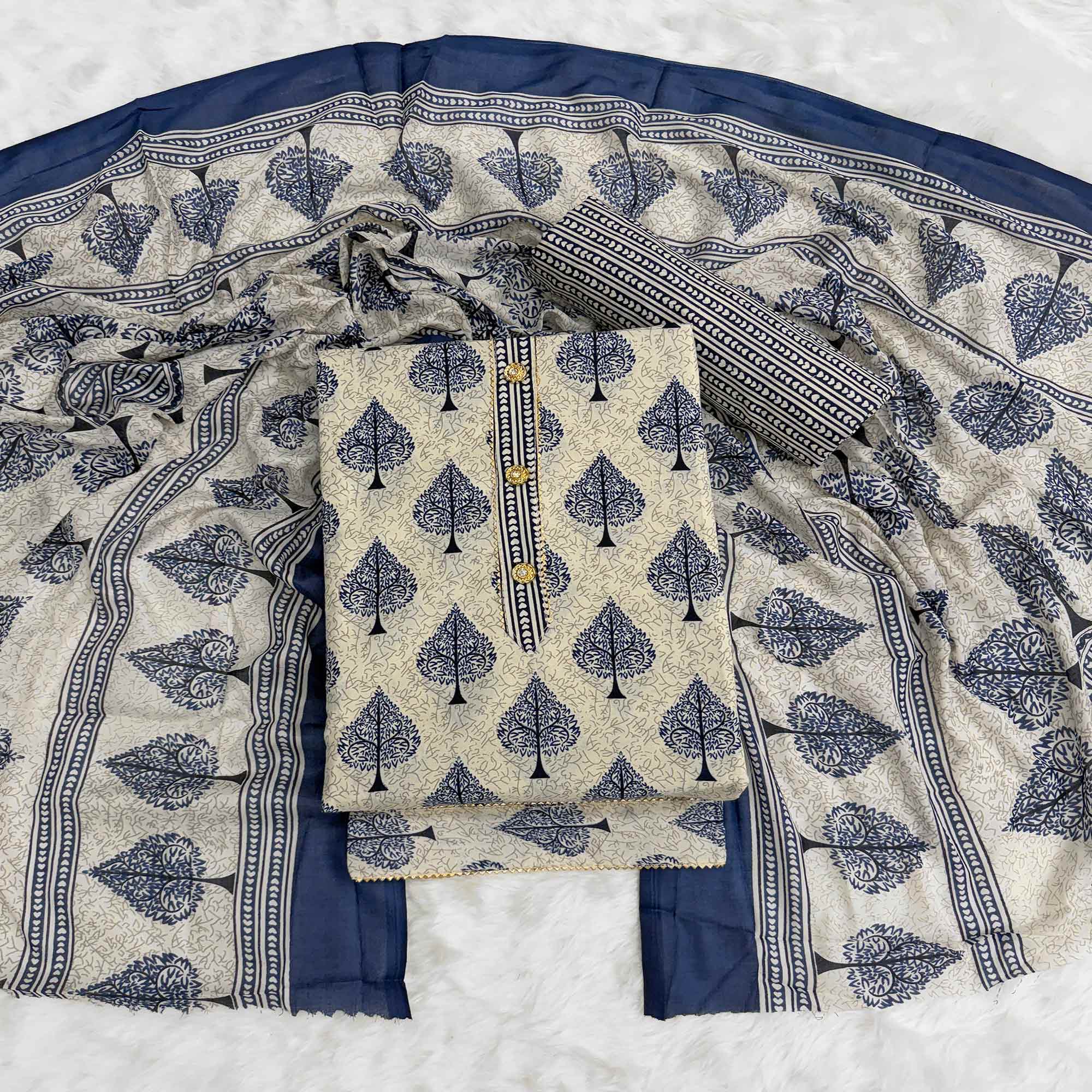 Vibrant Blue Leaf Printed Cotton Blend Dress Material Refined With Lace Border