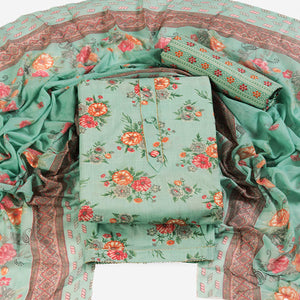 Charming Sea Green Dress Material in Pure Cotton with Subtle Floral Pattern Work