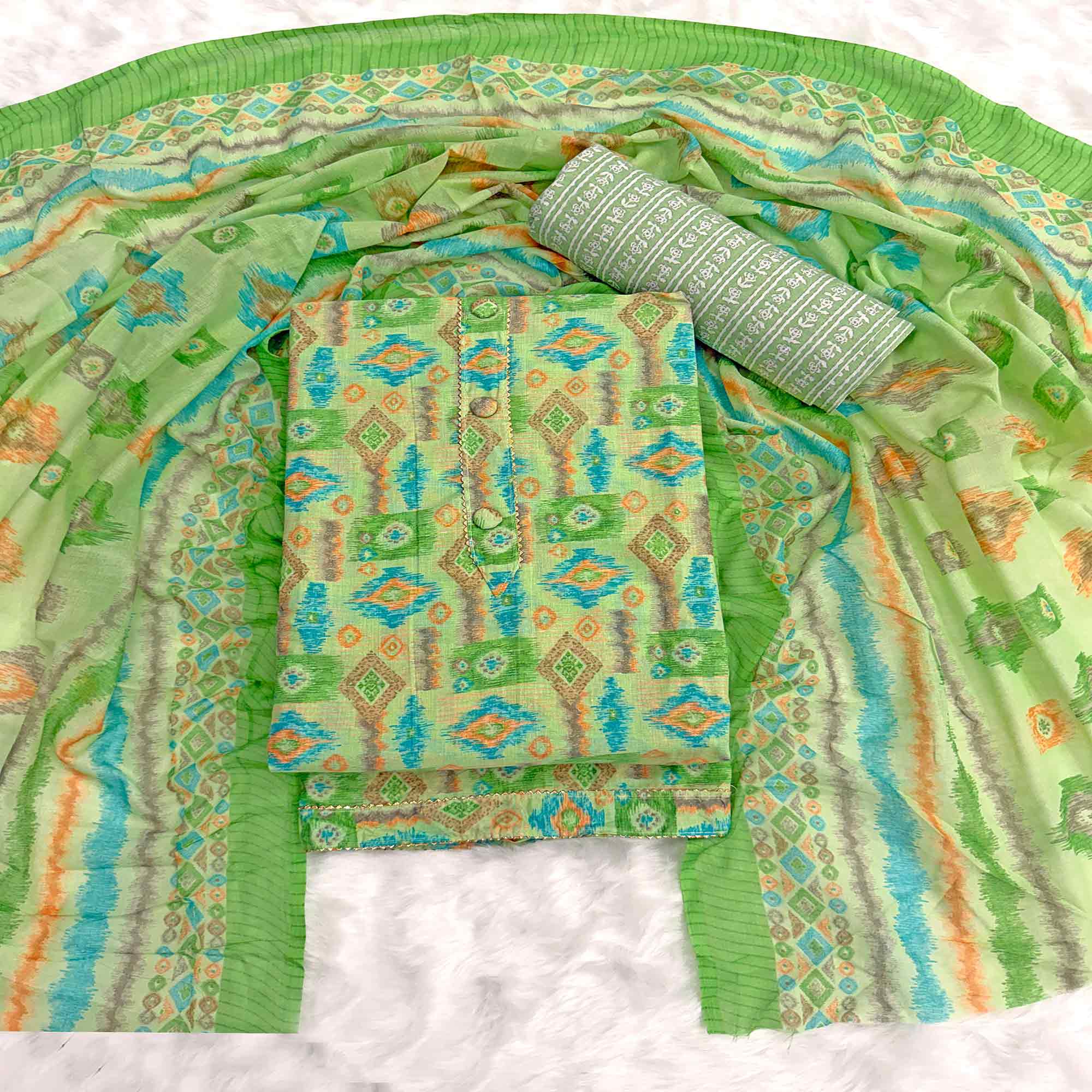 Green Contemporary Ikat & Geometric Style Print Pure Cotton Dress Material With Decorative Button
