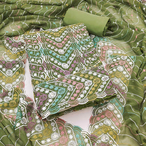 Green Dress Material In Rich Jacquard With Intricate Heavy Embroidery