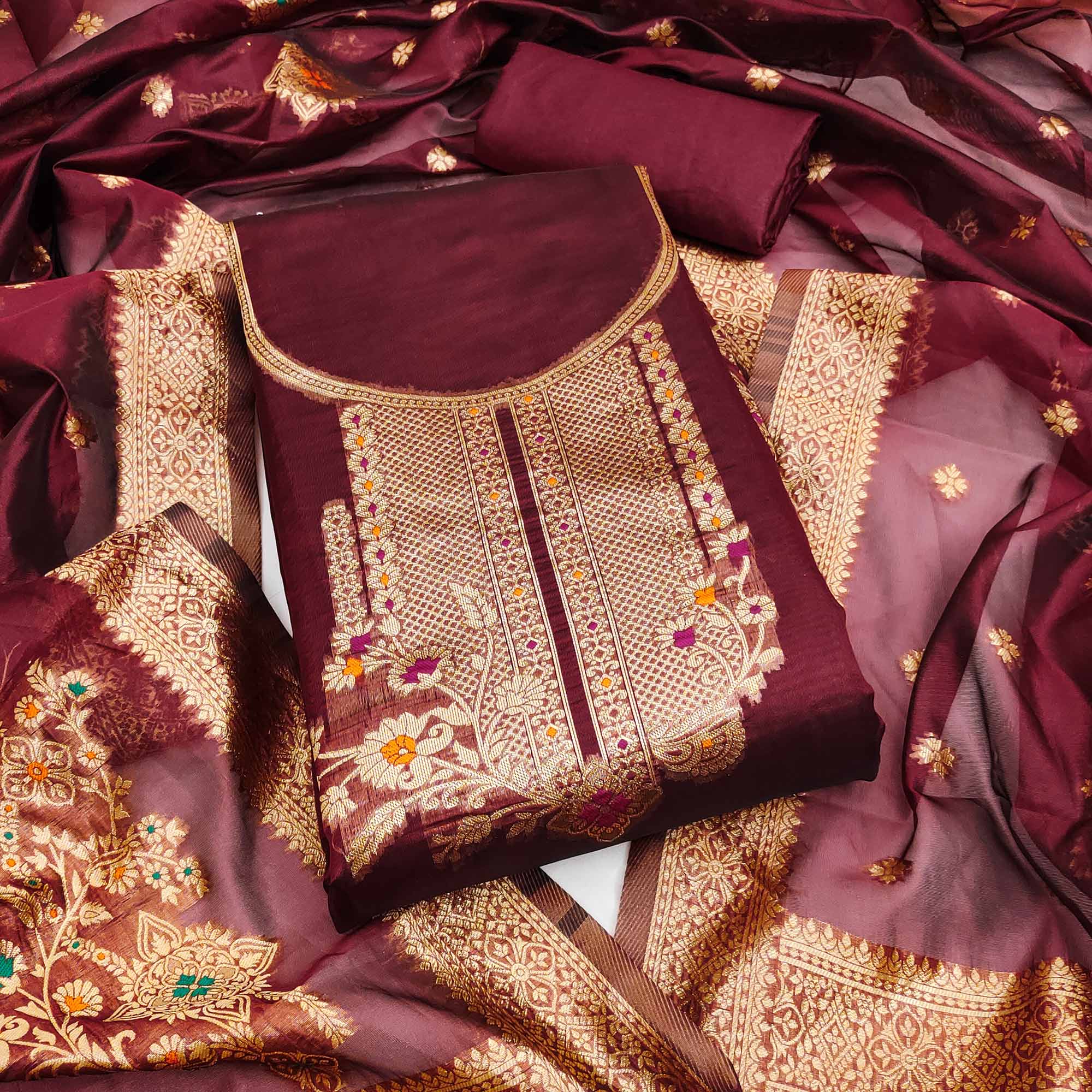 Maroon Organza Silk Dress Material Adorned With Exquisite Floral Zari Weaving Work