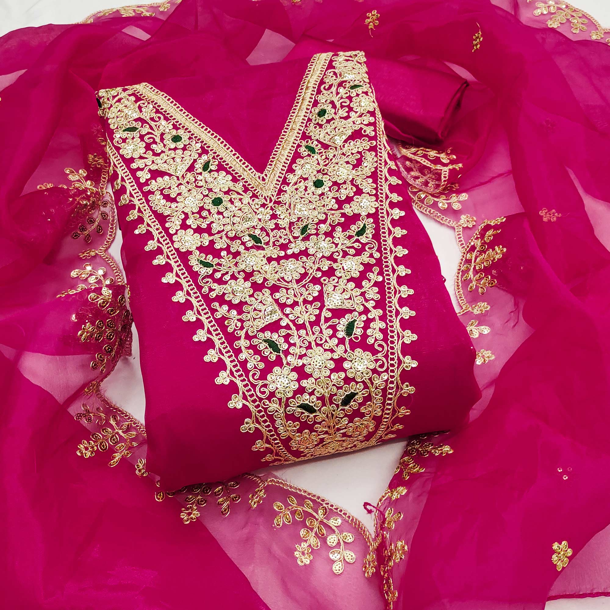 Rani pink Organza Fabric With Delicate Floral Cording Embroidery & Shimmering Sequins Work