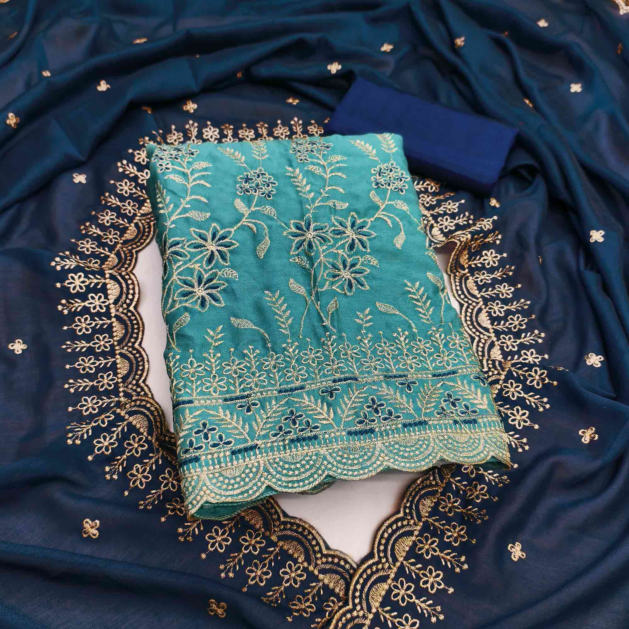Graceful Blue Vichitra Silk Dress Material Adorned With Intricate Floral Thread Embroidery