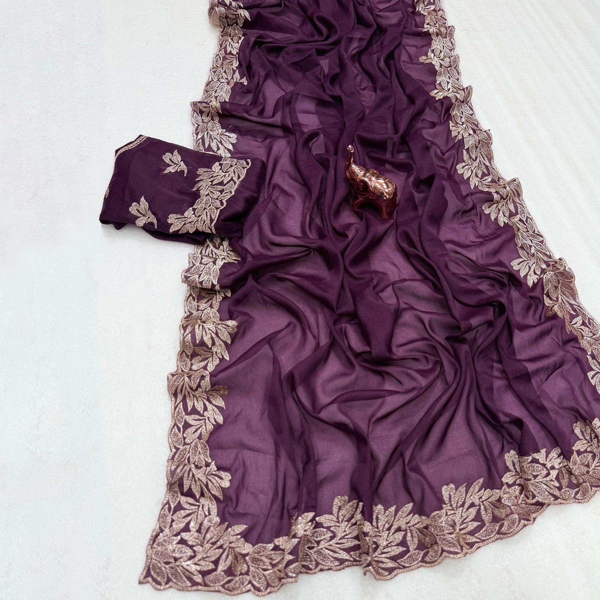Stylish Wine Star Chiffon Saree with Traditional Zari Embellished Border