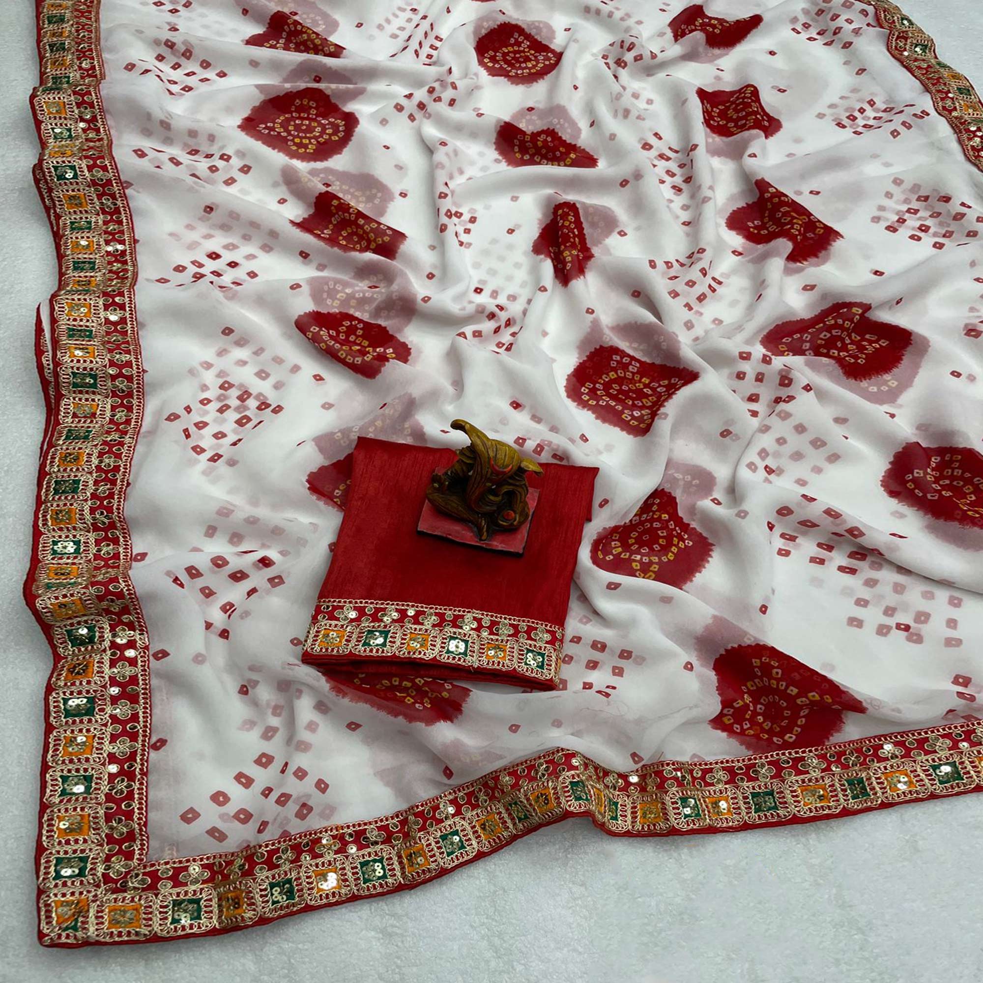 White & Red Bandhani Printed With Sequins Embroidered Georgette Saree