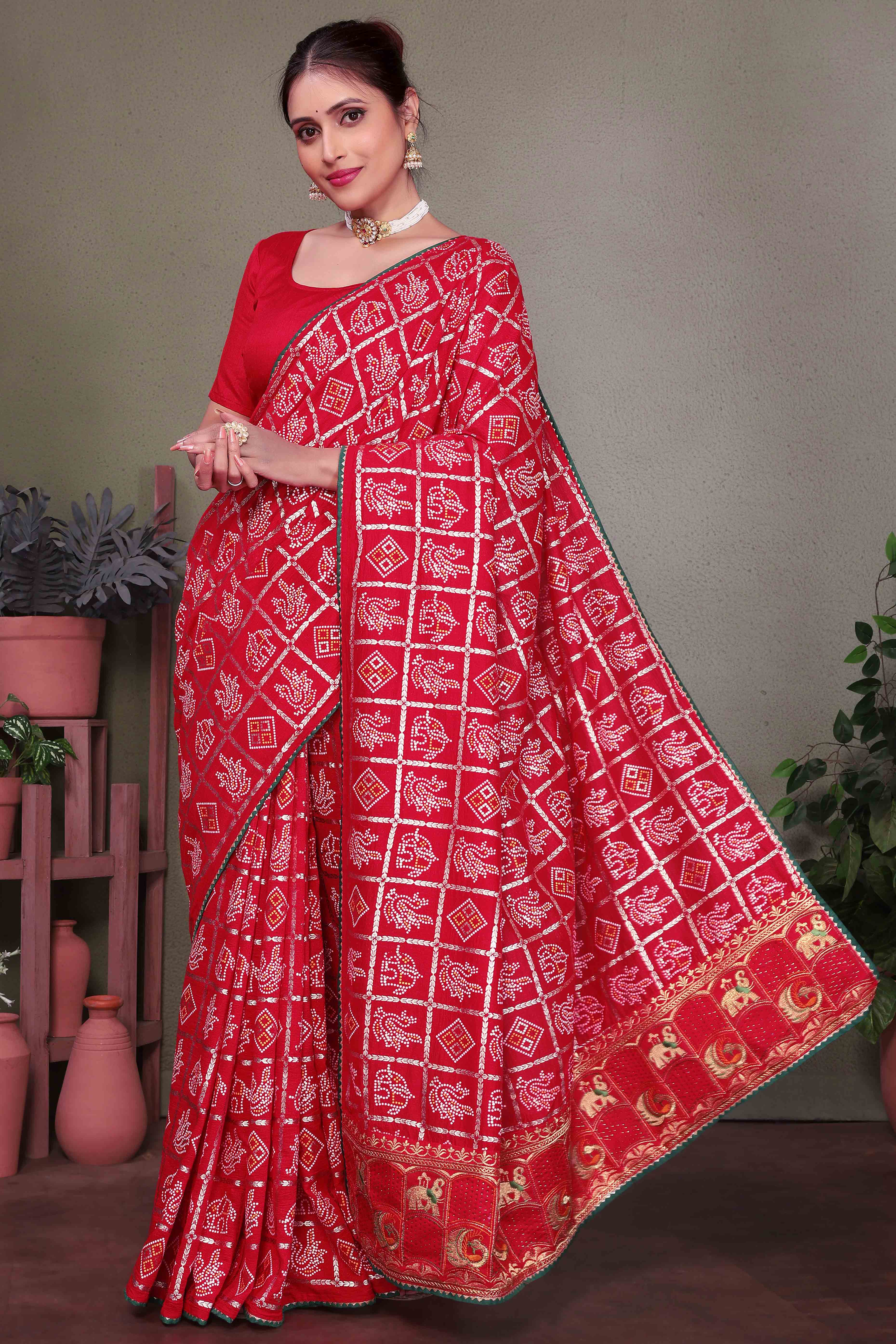 Red Vichitra Silk Saree Featuring Bandhani Patterns and Graceful Embroidered Borders