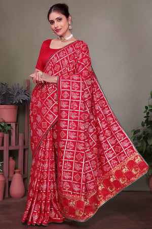 Red Vichitra Silk Saree Featuring Bandhani Patterns and Graceful Embroidered Borders