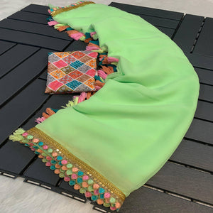 Green Solid Georgette Saree With Sequins Embroidered Border