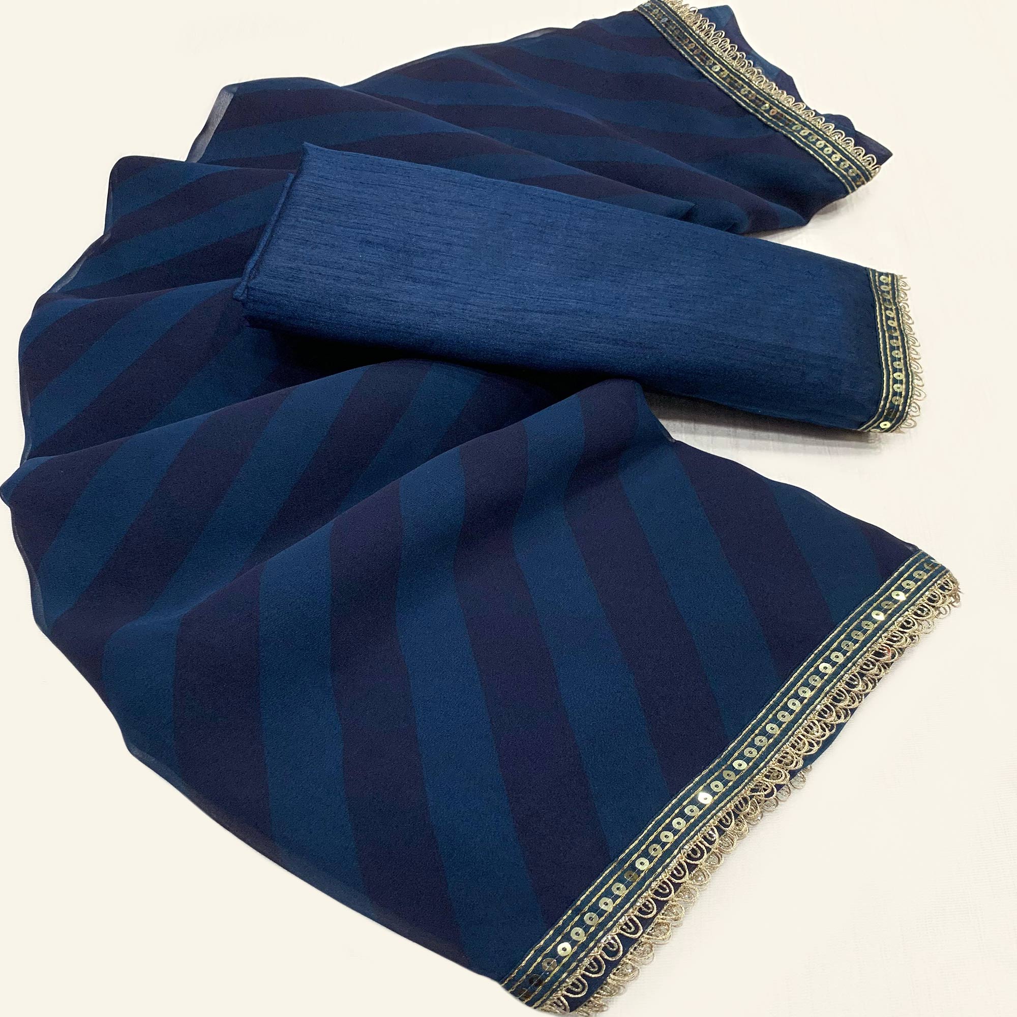 Blue Printed Georgette Saree With Lace Border