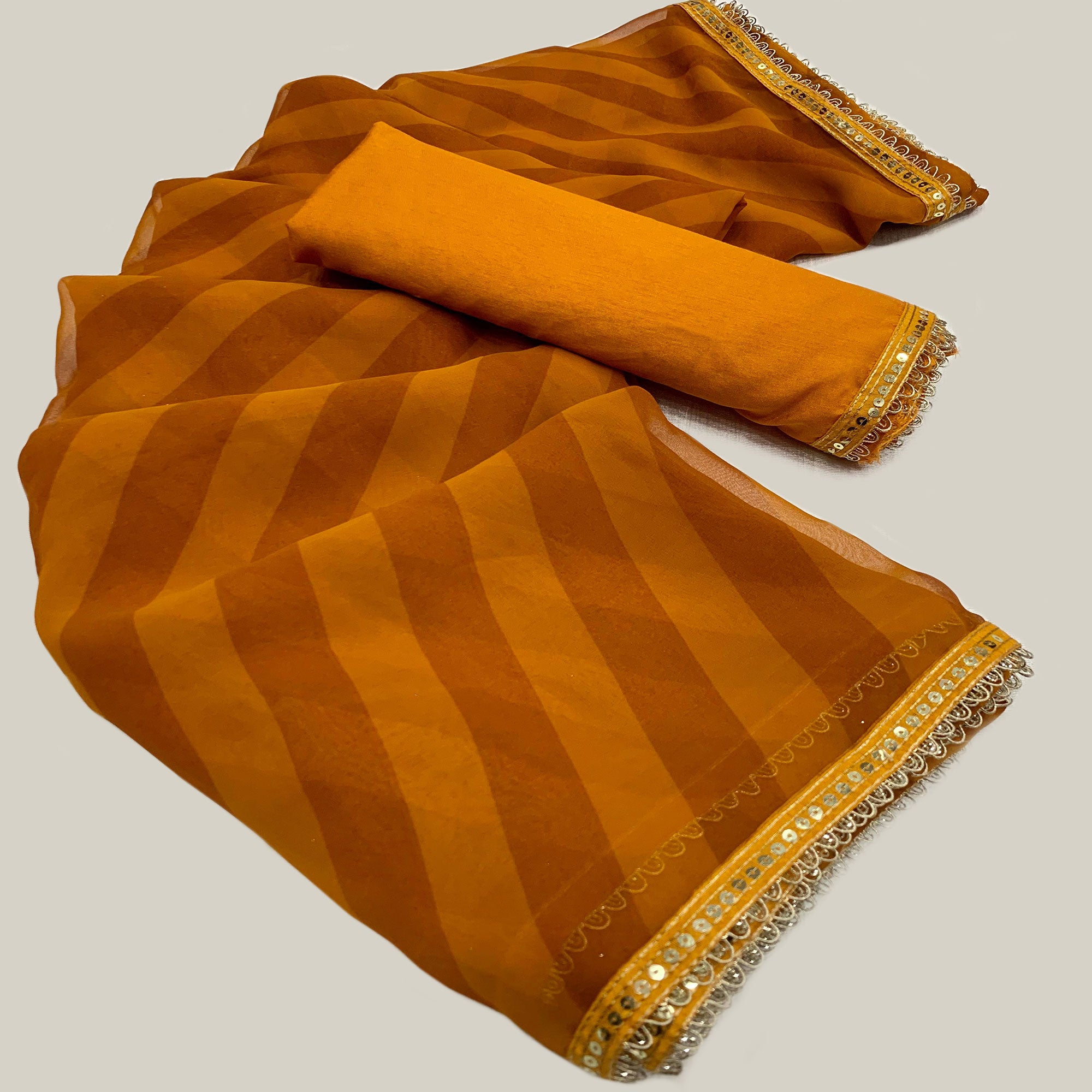 Mustard Printed Georgette Saree With Lace Border