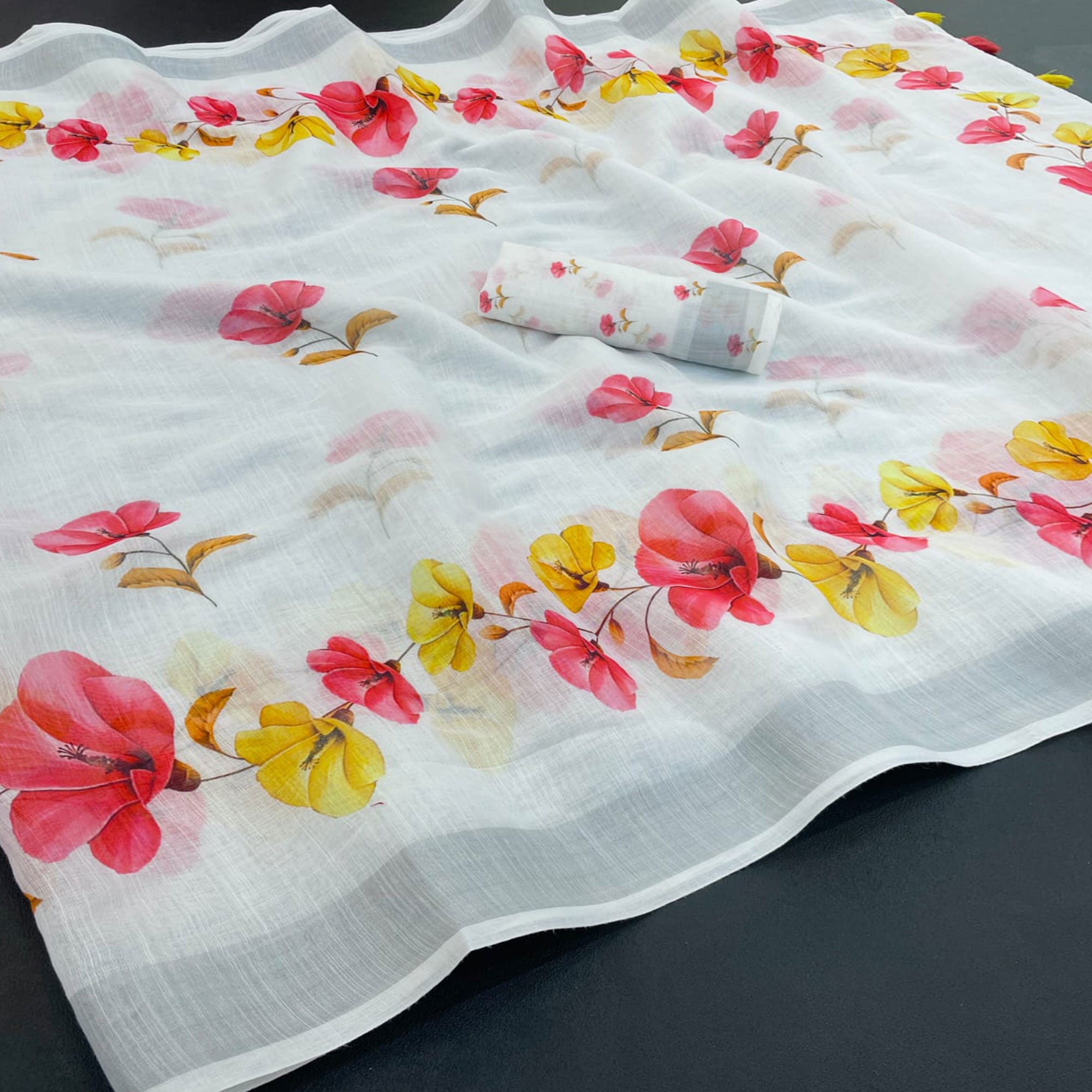 Elegant White Floral Printed Linen Cotton Saree With Delicate Tassel Detailing