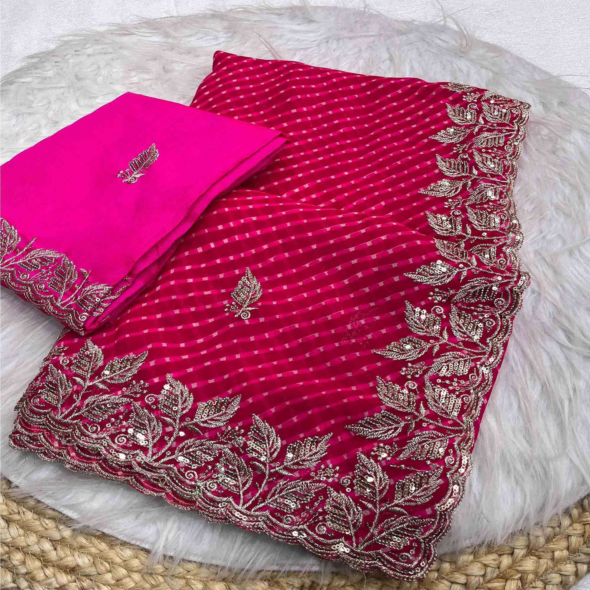 Pink Bandhani Georgette Saree Enhanced with Lavish Embroidered Border