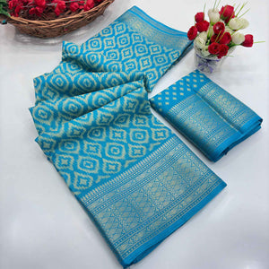 Blue Ikkat Printed Dola Silk Saree Highlighted With Premium Zari Weaving Border
