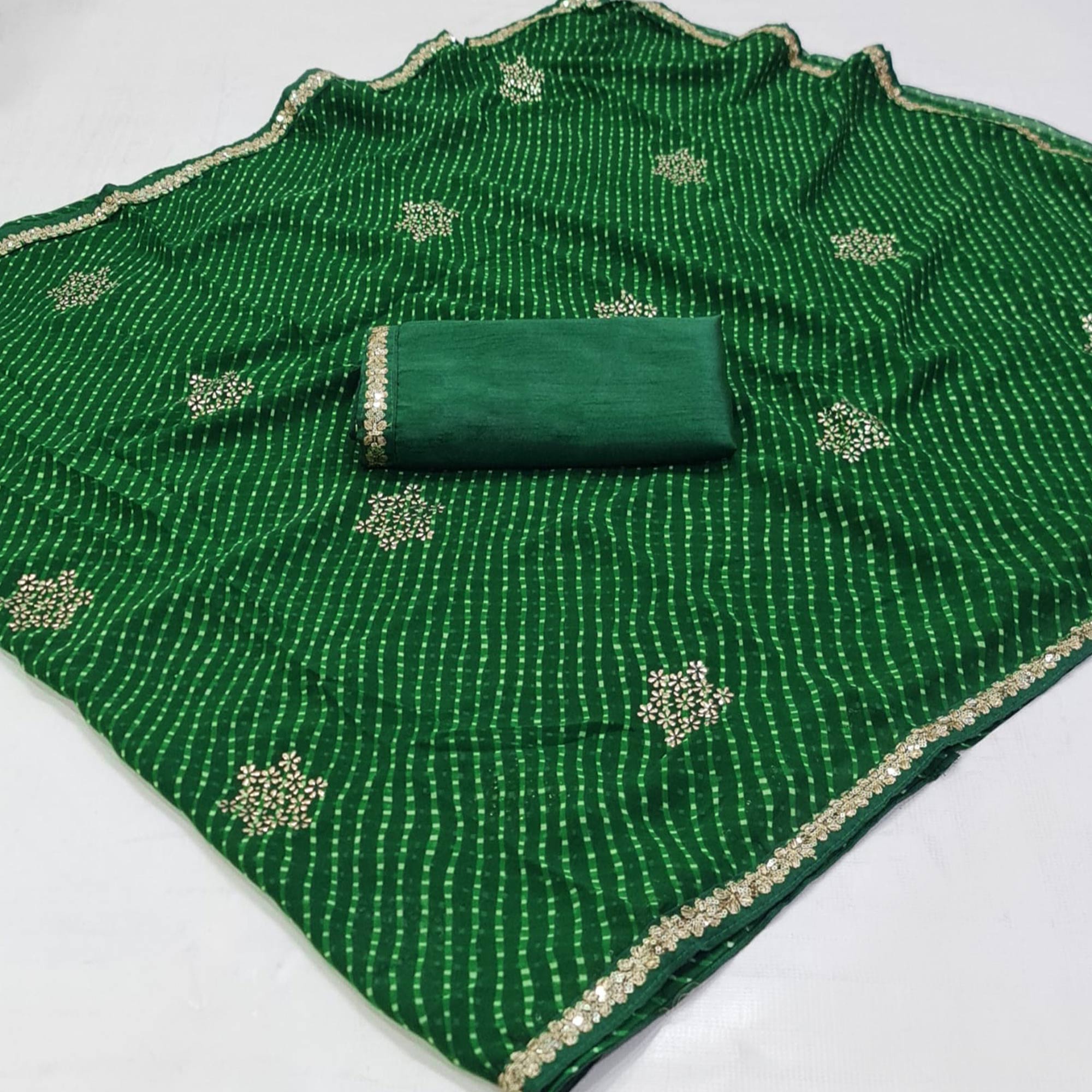 Dark Green Printed Georgette Saree With lace Border