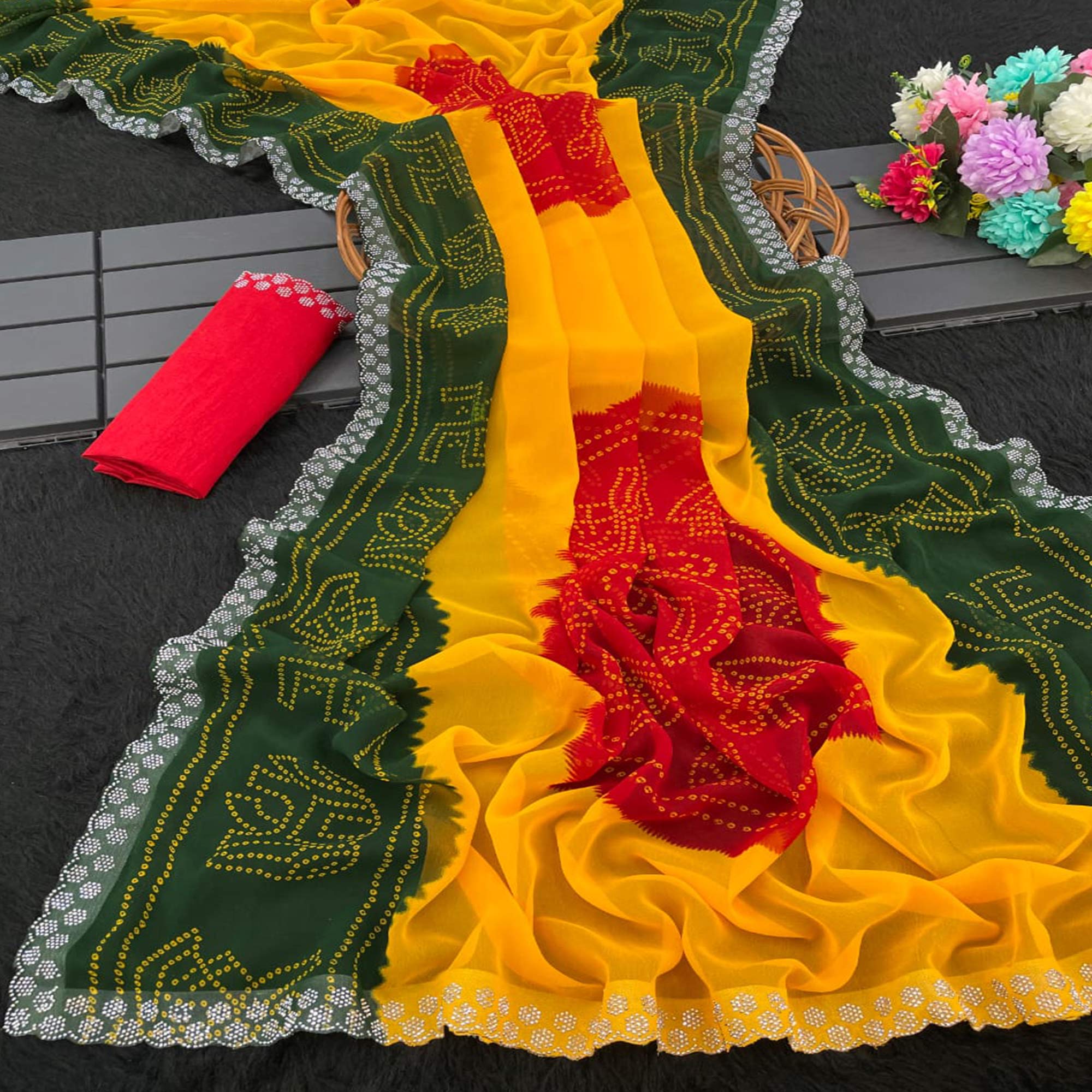 Green & Yellow Georgette Saree With Traditional Bandhani Print And Sparkling Stone Work Border