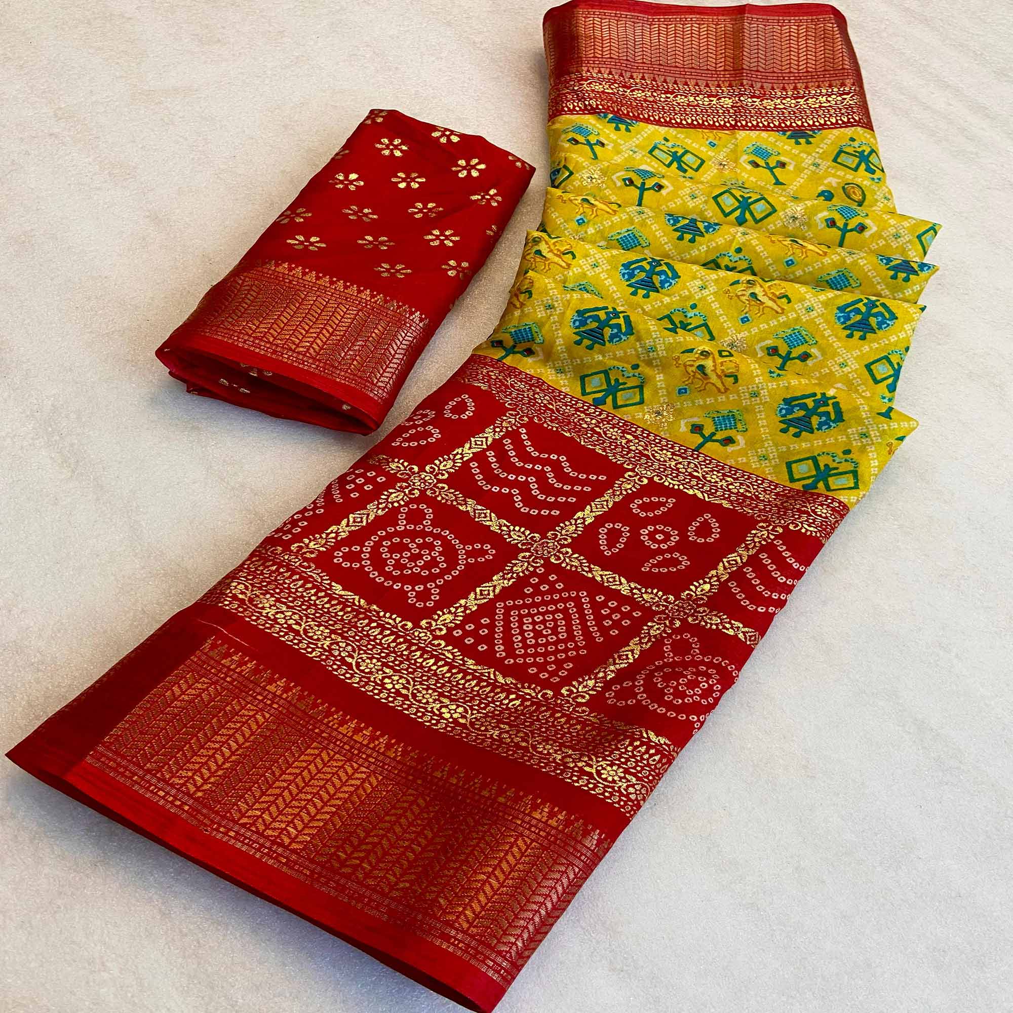 Yellow Patola Printed Dola Silk Saree With Zari Border