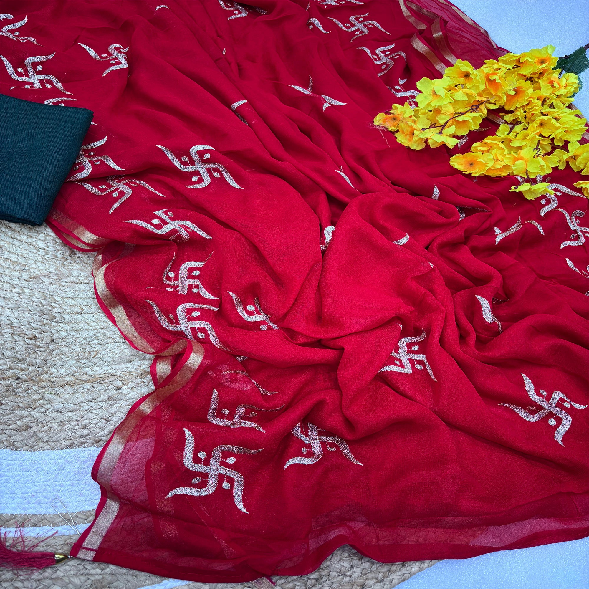 Festive Red Georgette Saree Enhanced with Fine Swastik Embroidered Motifs