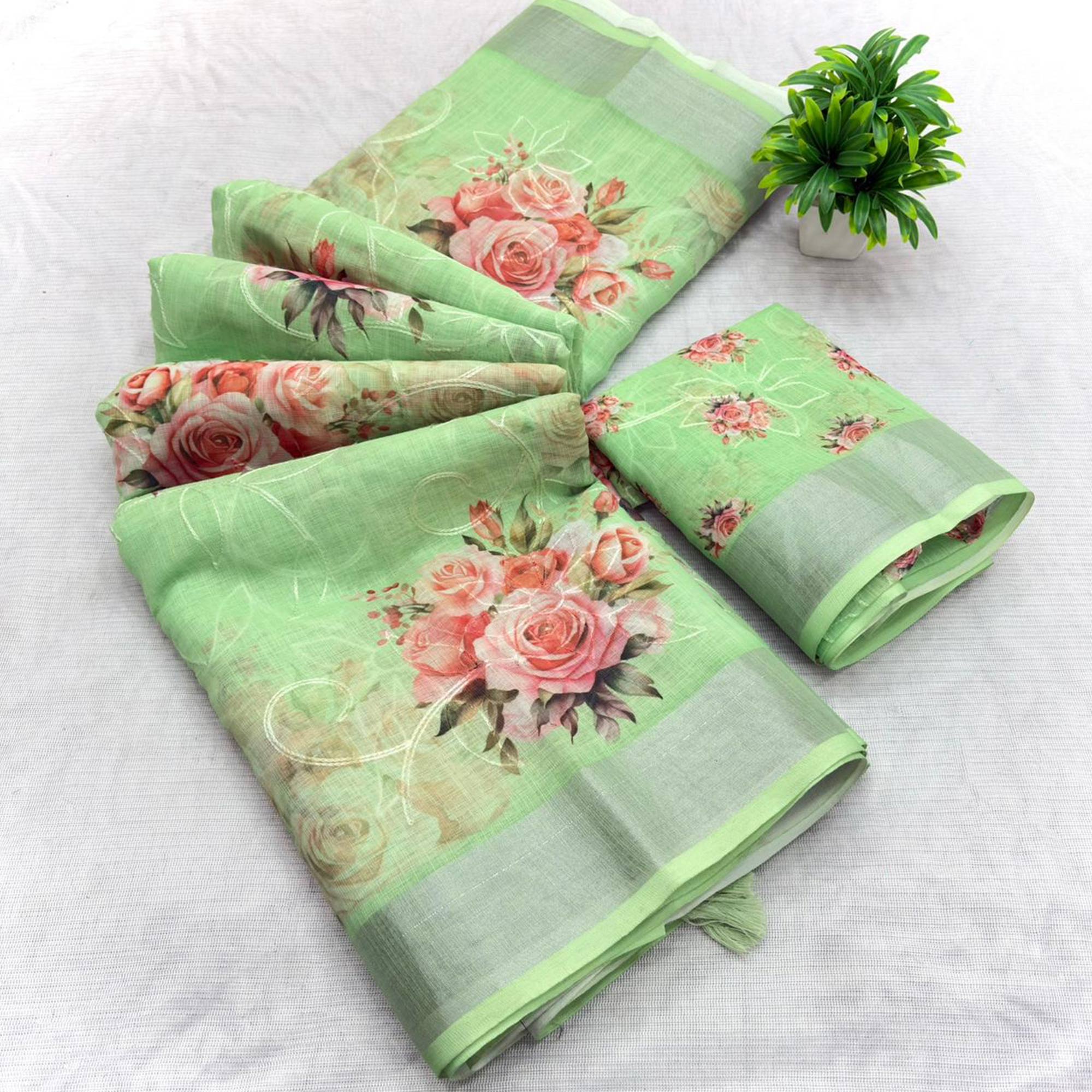 Green Floral Printed Linen Cotton Saree with Subtle Texture and Thread Work Highlights