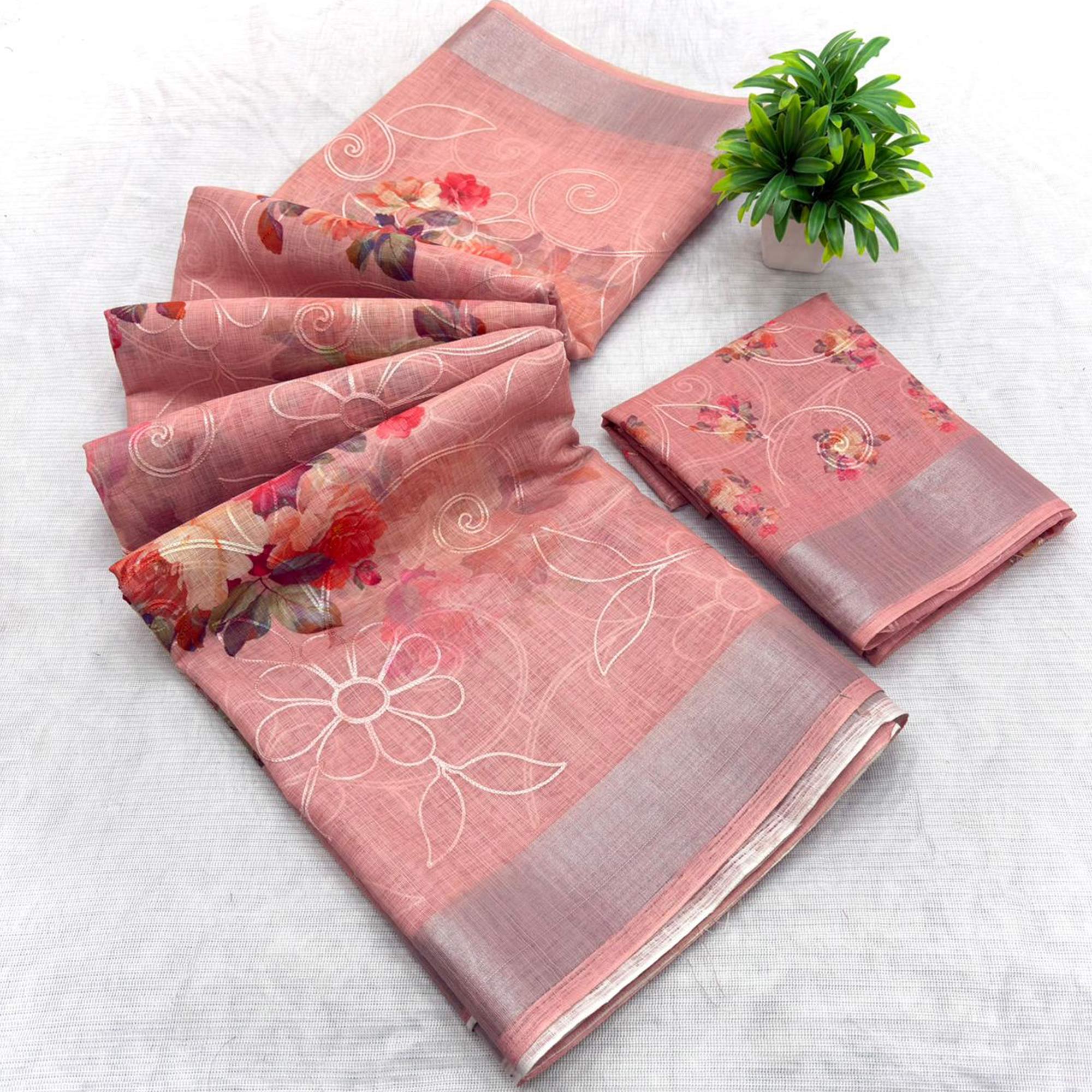 Peach Floral Printed Linen Cotton Saree with Subtle Texture and Thread Work Highlights