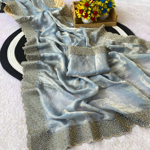 Greyish Blue Fandy Satin Saree Featuring Intricate Swarovski Work & Decorative Zarkan Border