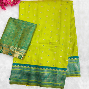 Graceful Green Silk Blend Saree Adorned With Intricate Floral Zari Weaving