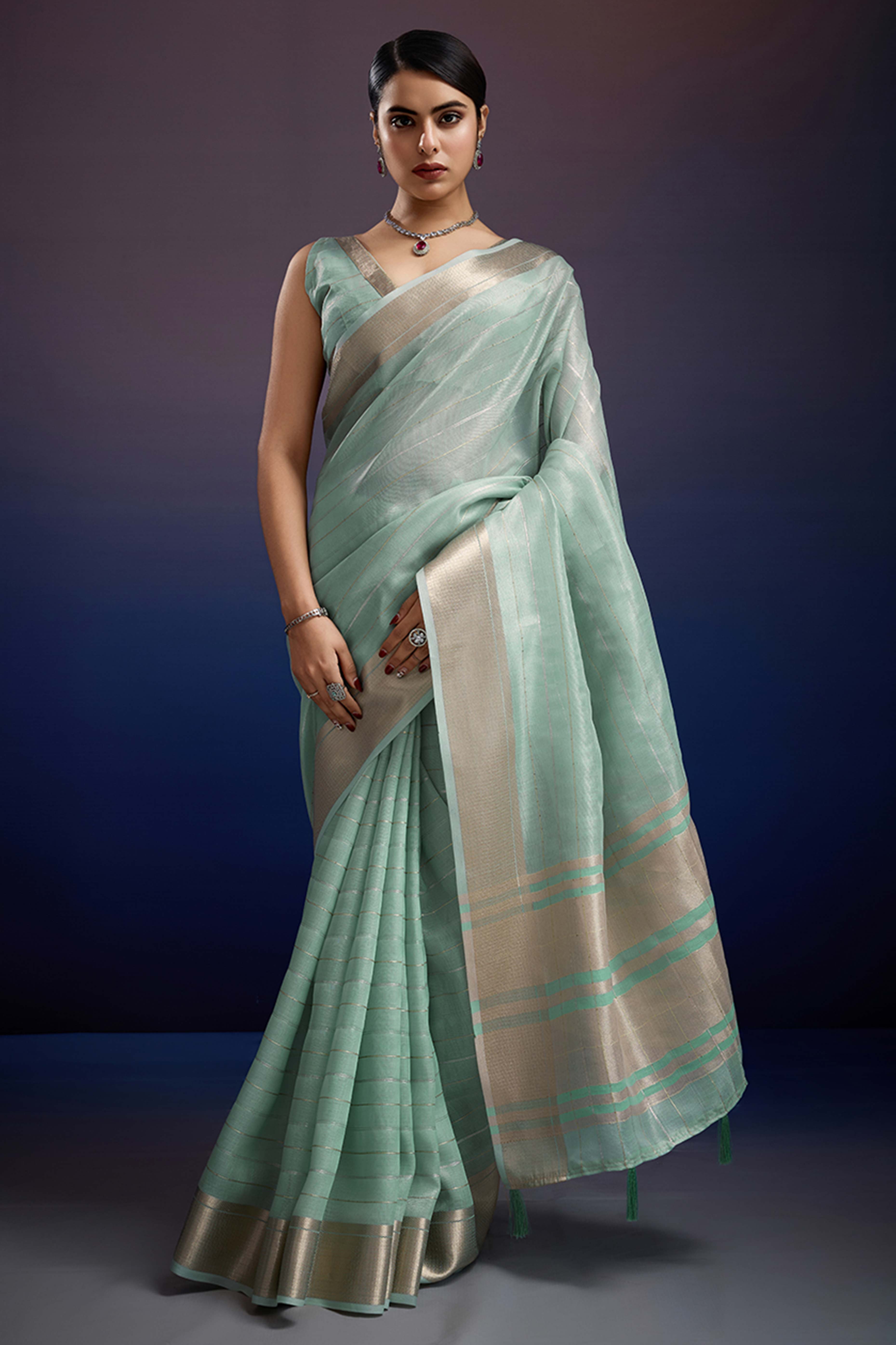 Mint Green Pure Linen Saree with Gold Toned Zari Weave