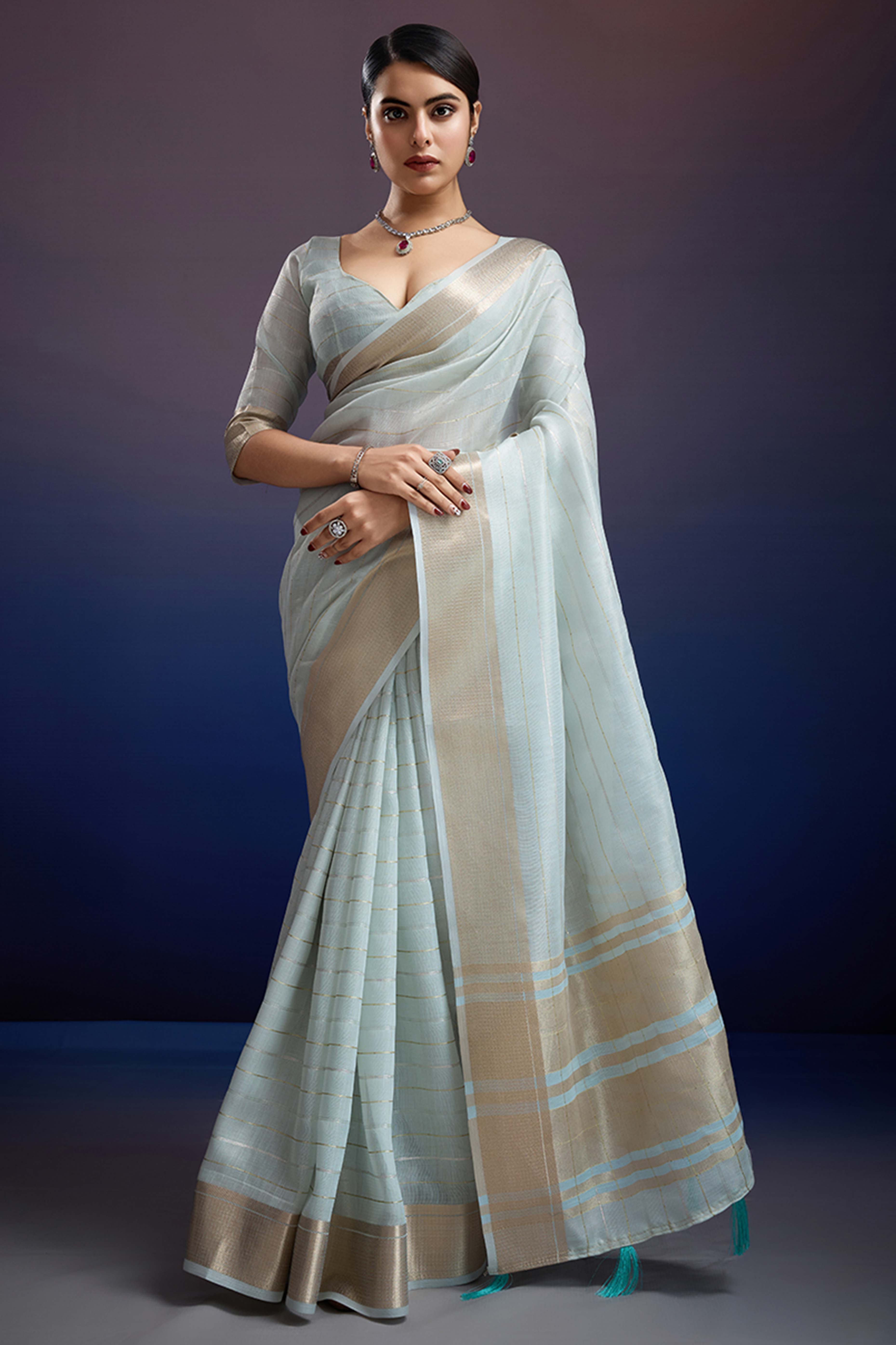 Pastel Blue Pure Linen Saree with Gold Toned Zari Weave