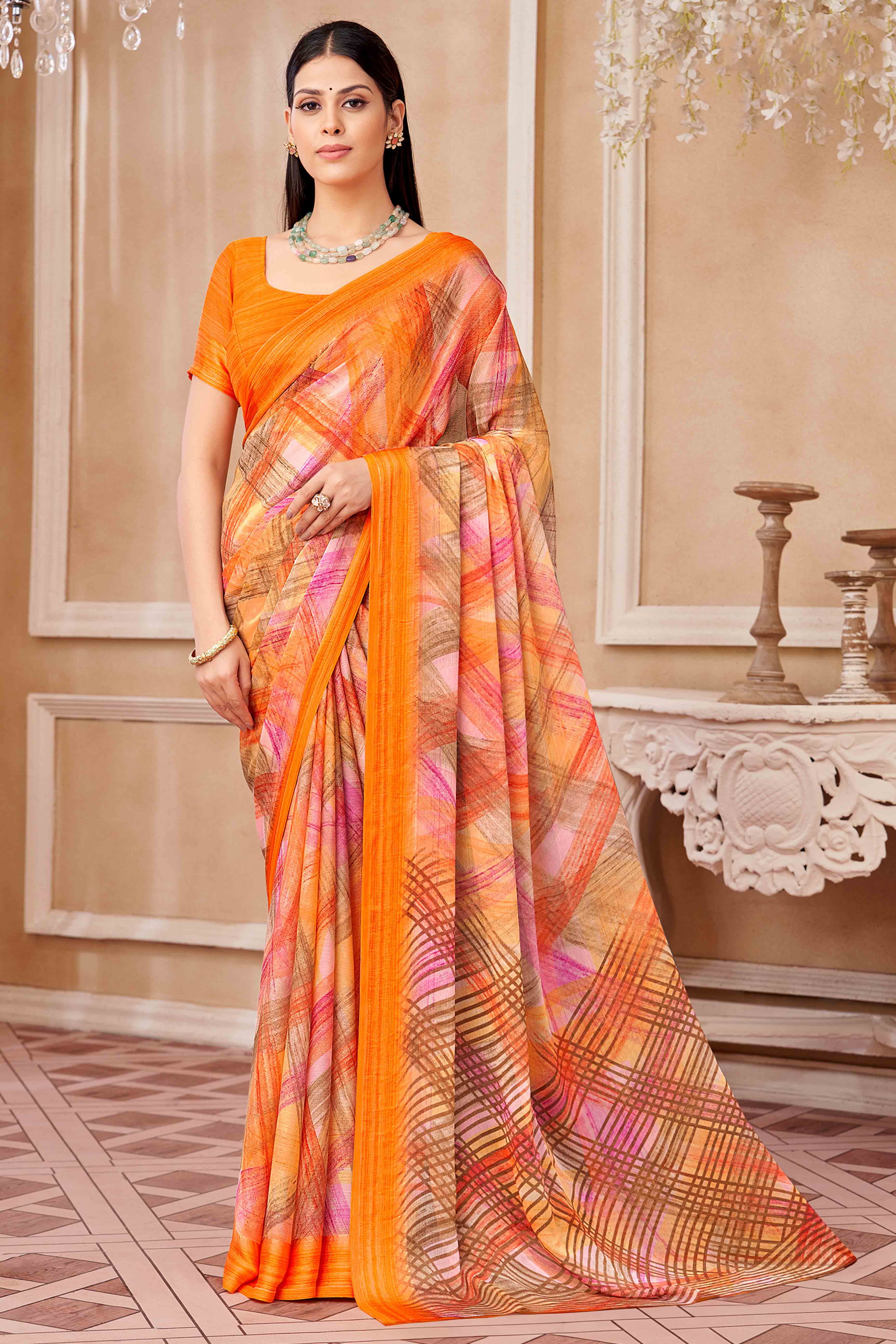 Orange Chiffon Saree With Delicate Prints & Elegant Satin Woven Border