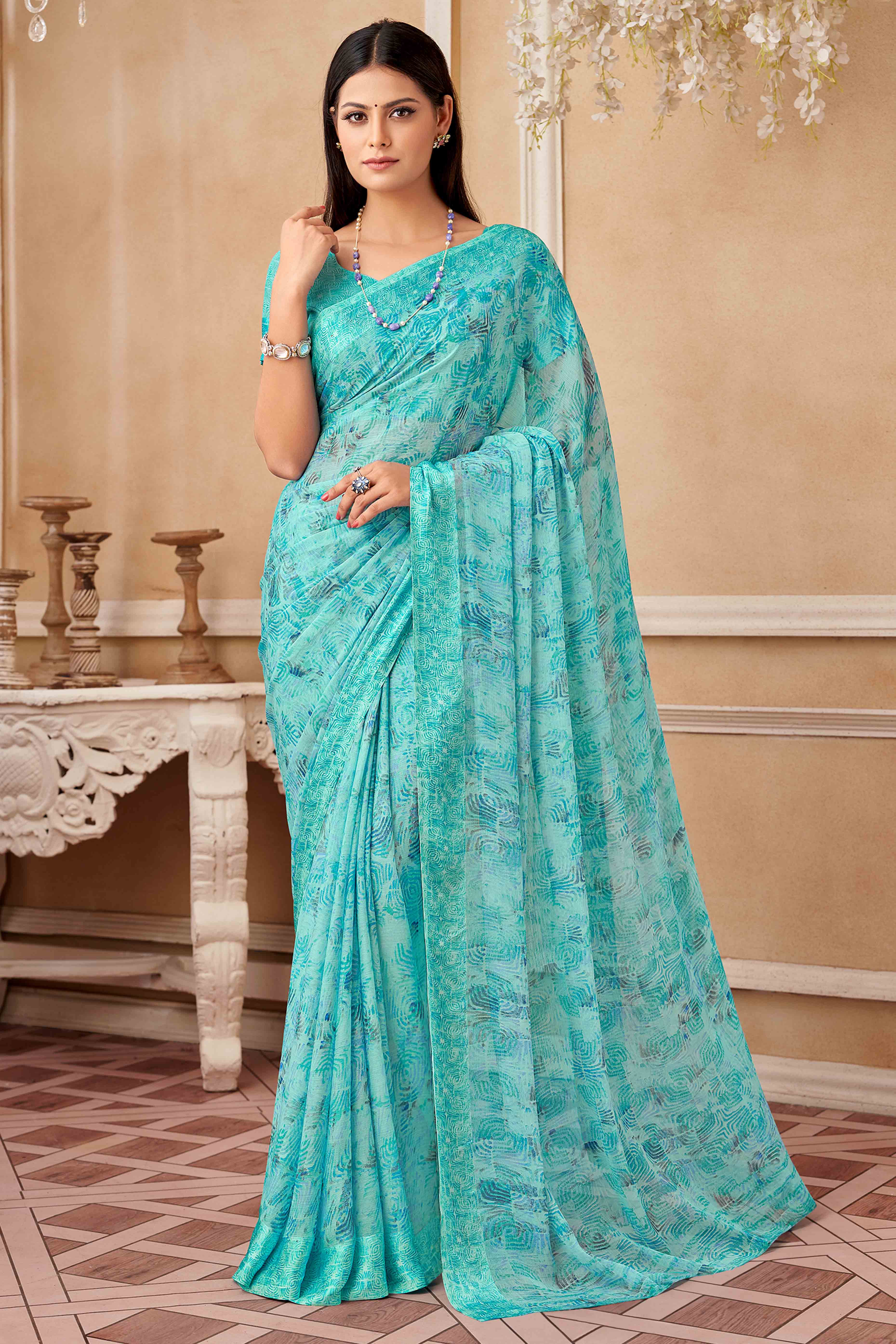 Blue Chiffon Saree With Delicate Prints & Elegant Satin Woven Border