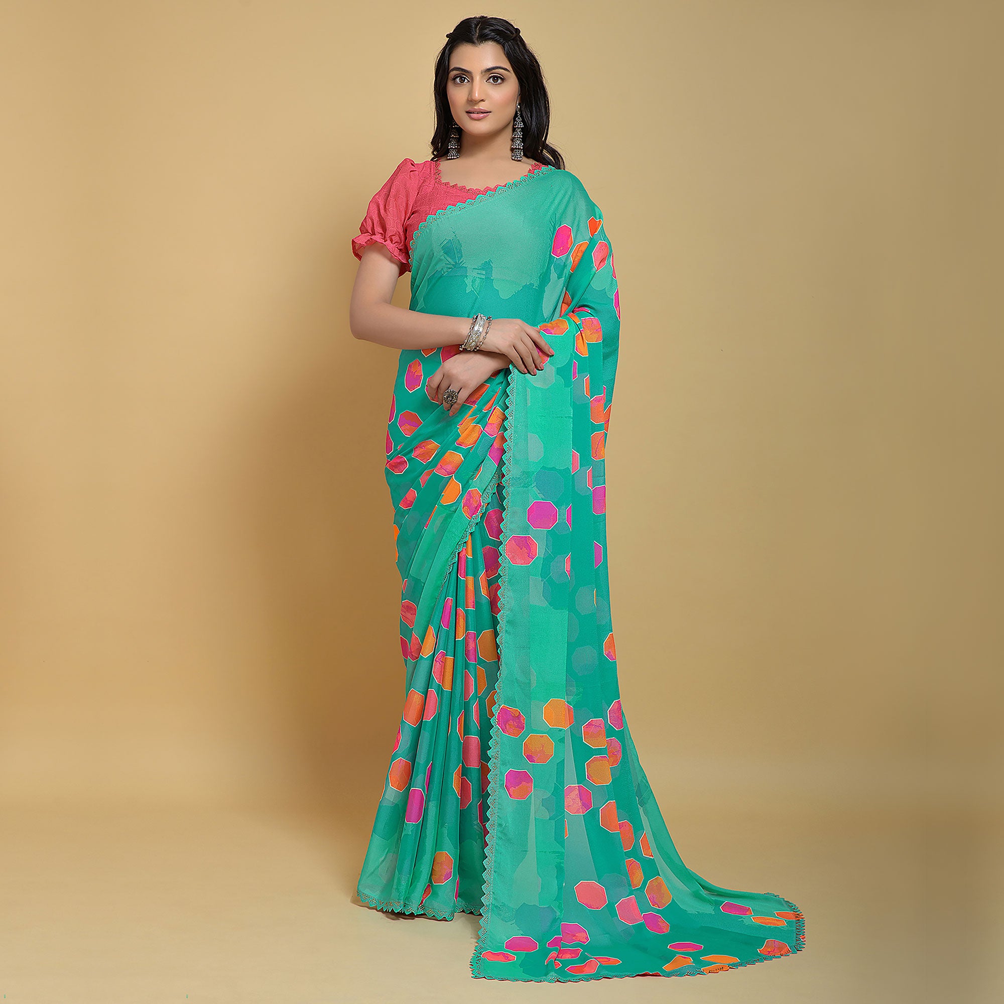Turquoise Printed Georgette Saree With Swarovski Border