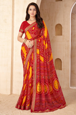 Red & Mustard Bandhani Printed Chiffon Saree Enhanced with Delicate Lace Border Work