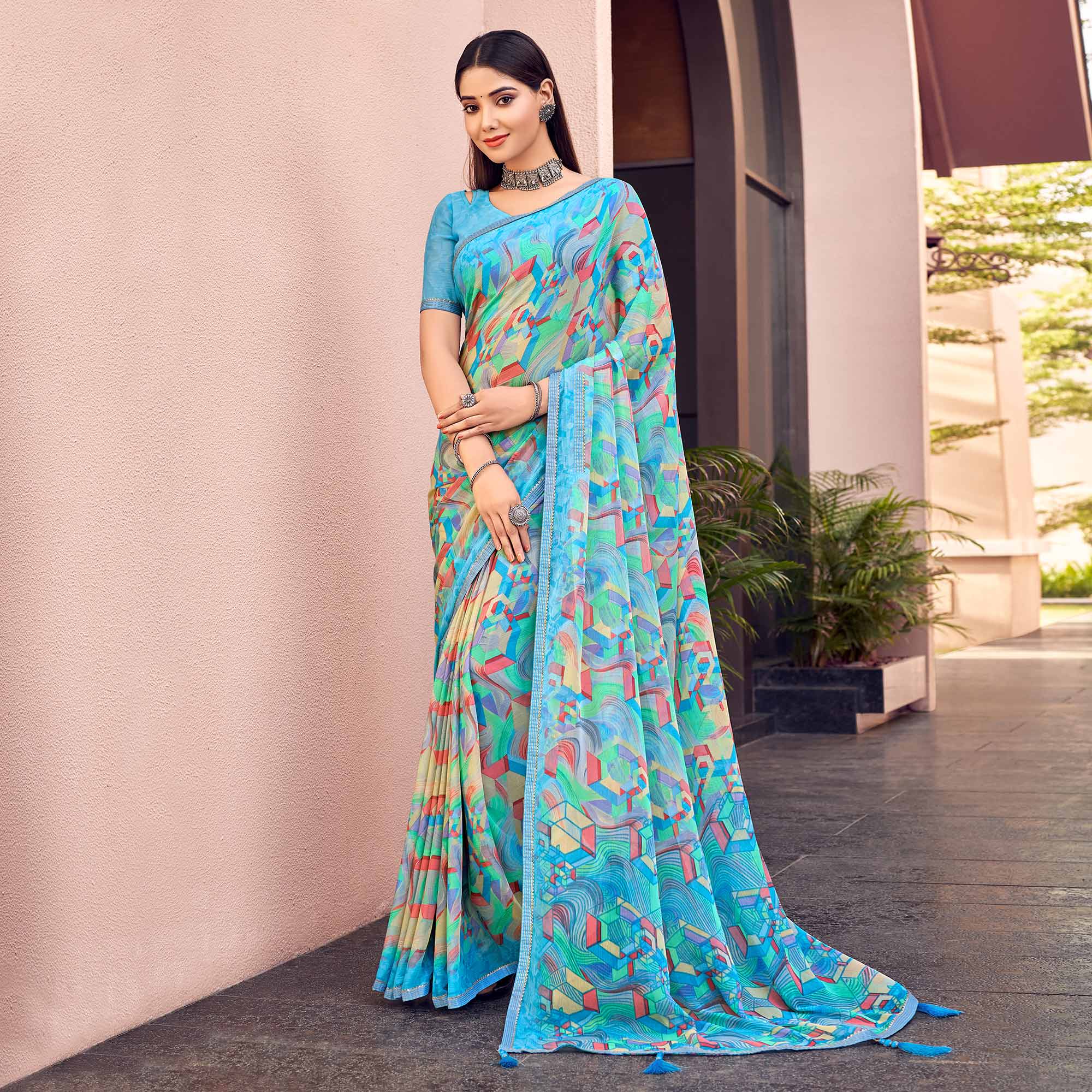 Blue Printed Chiffon Saree With Tassels