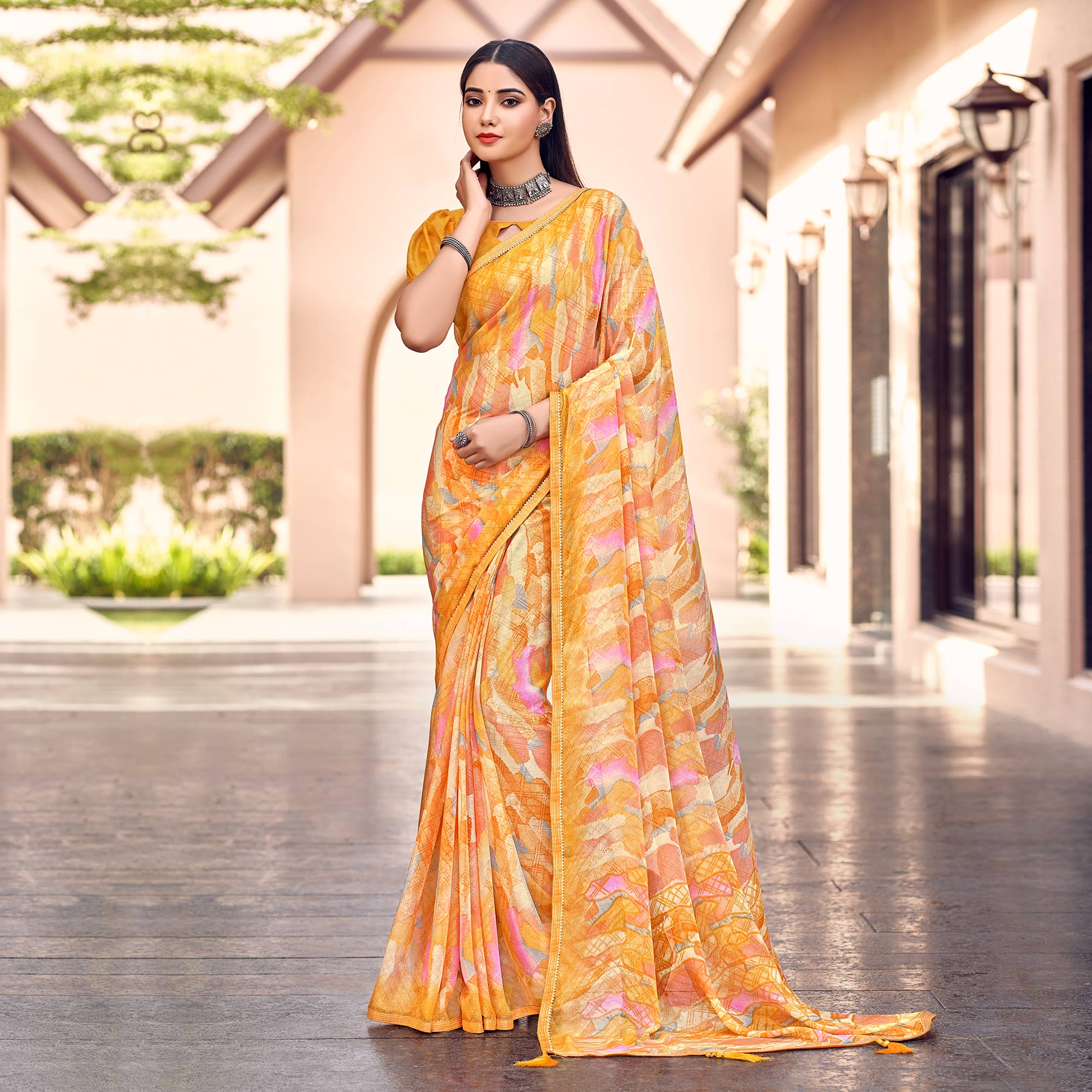 Yellow Printed Chiffon Saree With Tassels