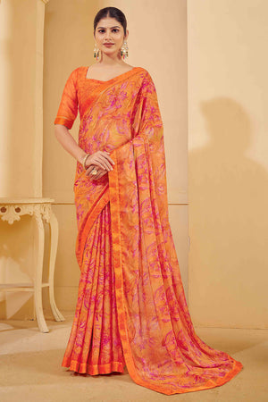 Orange Chiffon Saree Adorned With Artistic Floral Print & Finely Crafted Woven Lace Border