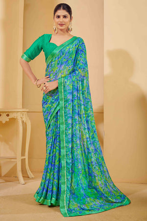 Green & Blue Chiffon Saree Adorned With Artistic Floral Print & Finely Crafted Woven Lace Border