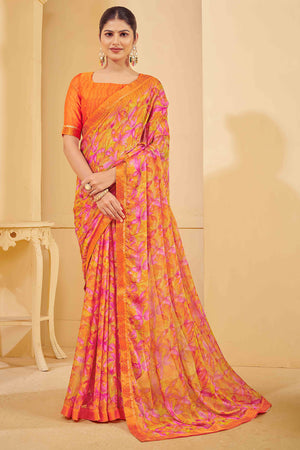 Orange Chiffon Saree Adorned With Artistic Floral Print & Finely Crafted Woven Lace Border