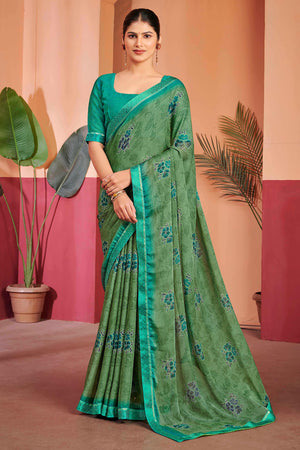 Green Chiffon Saree Featuring Delicate Floral Prints & A Graceful Lace Border