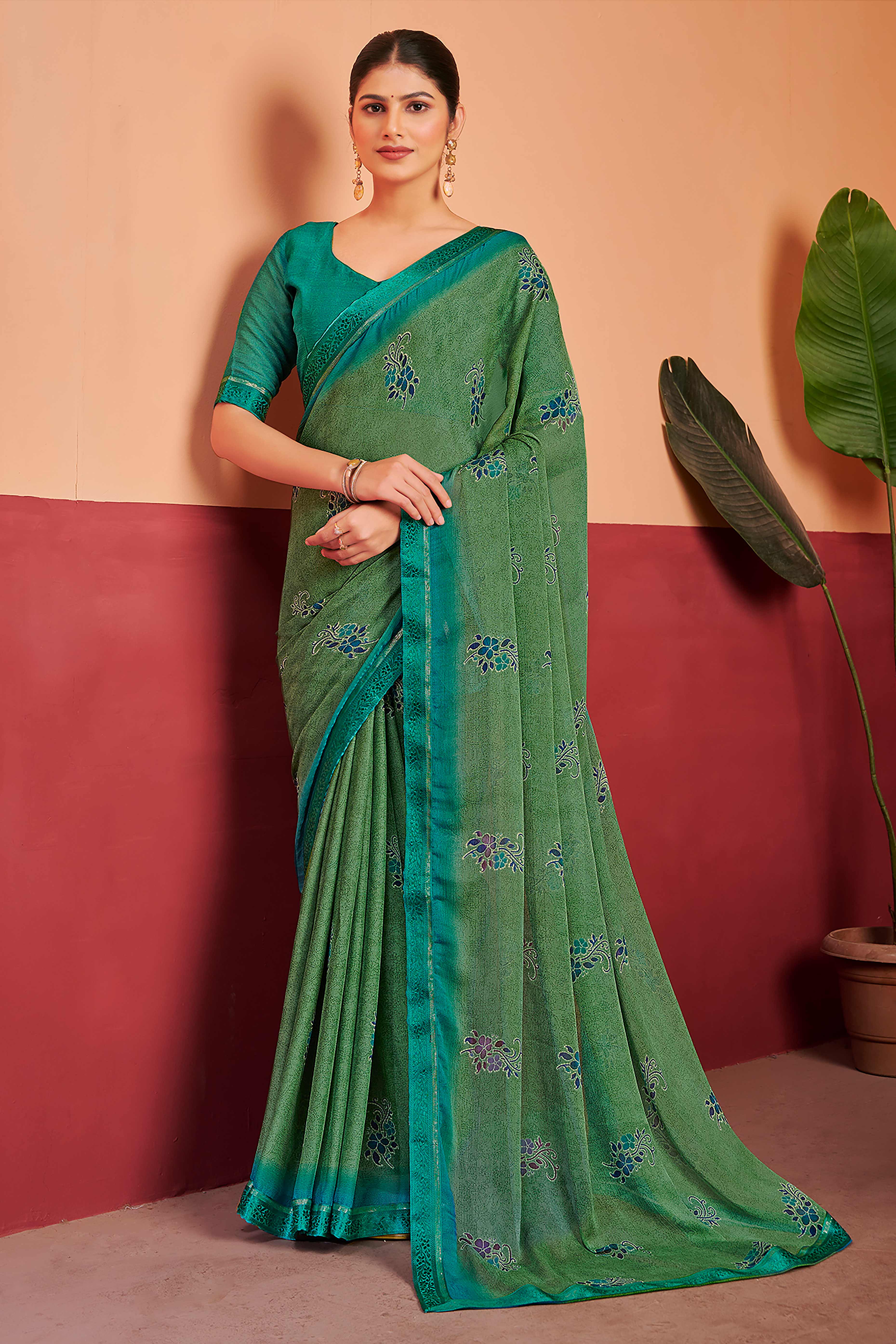 Green Chiffon Saree Featuring Delicate Floral Prints & A Graceful Lace Border