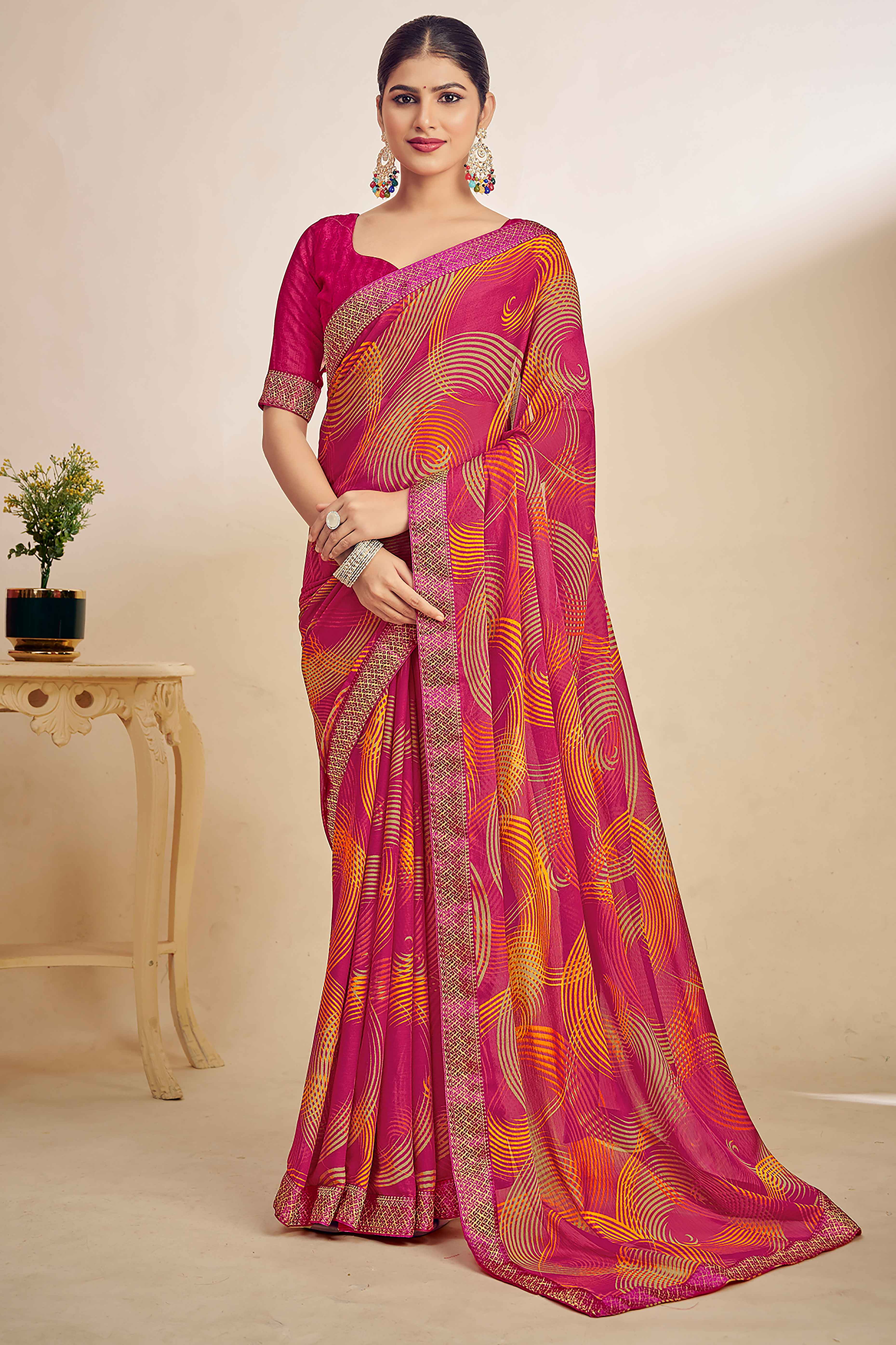 Rose pink Chiffon Saree Adorned With Artistic Print & Finely Crafted Woven Lace Border