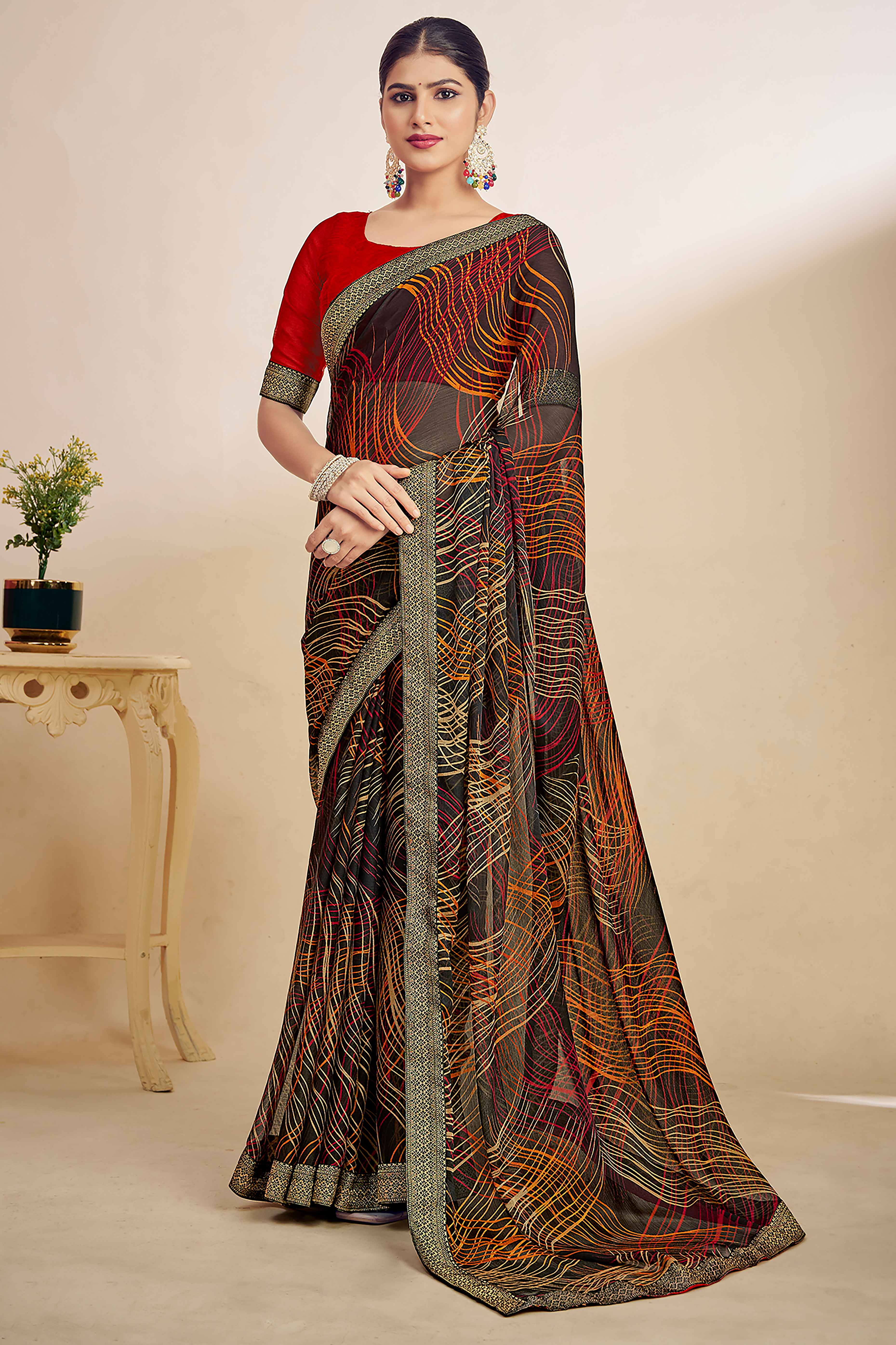 Black Chiffon Saree Adorned With Artistic Print & Finely Crafted Woven Lace Border