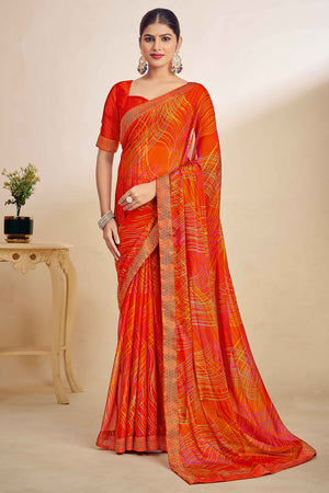 Orange Chiffon Saree Adorned With Artistic Print & Finely Crafted Woven Lace Border