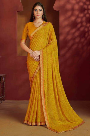 Floral Printed Chiffon Saree in Mustard with Elegant Lace Work for Casual Occasions
