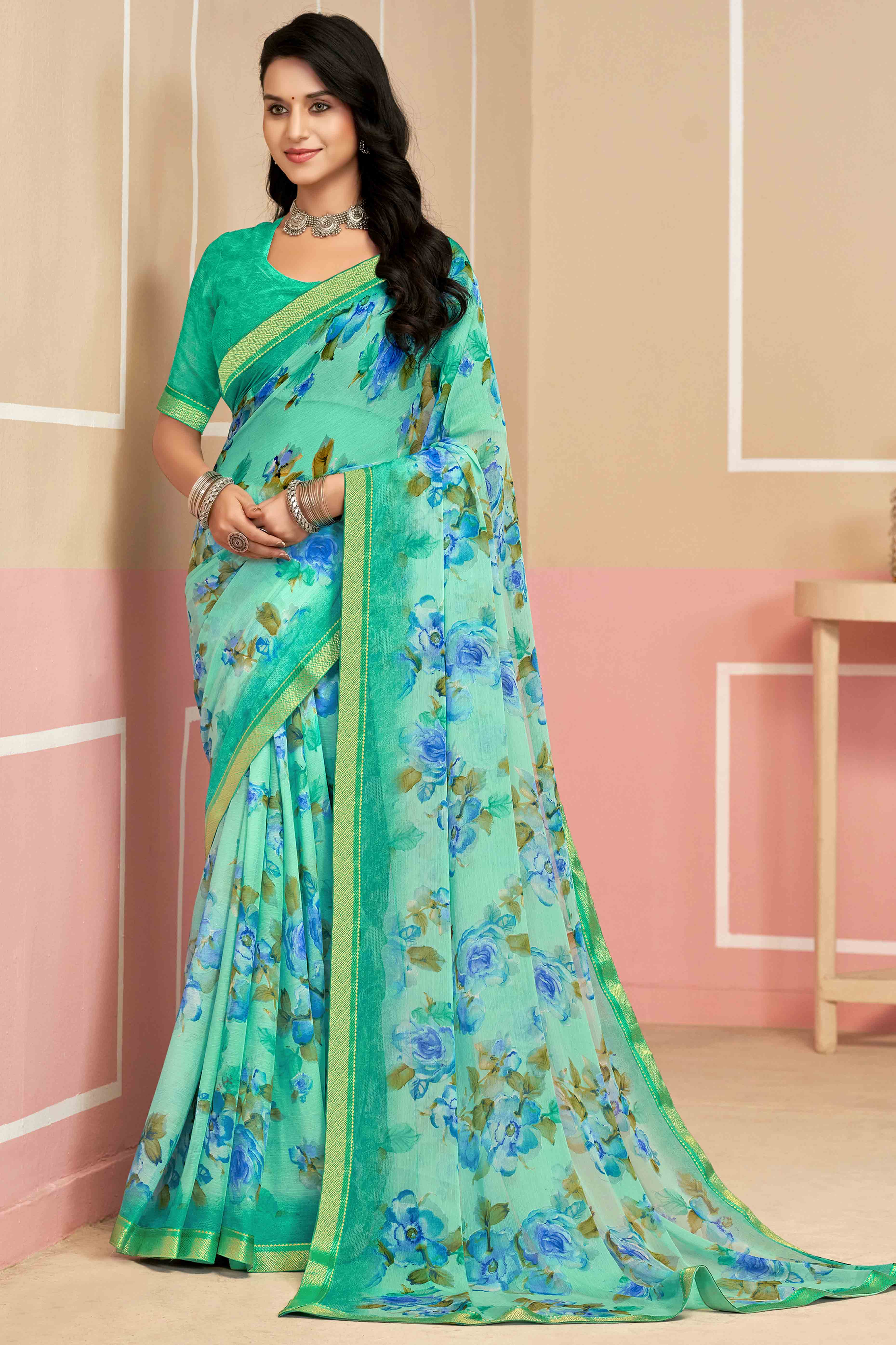Majestic Floral Printed Chiffon Saree In Turquoise with Delicate Woven Lace Border