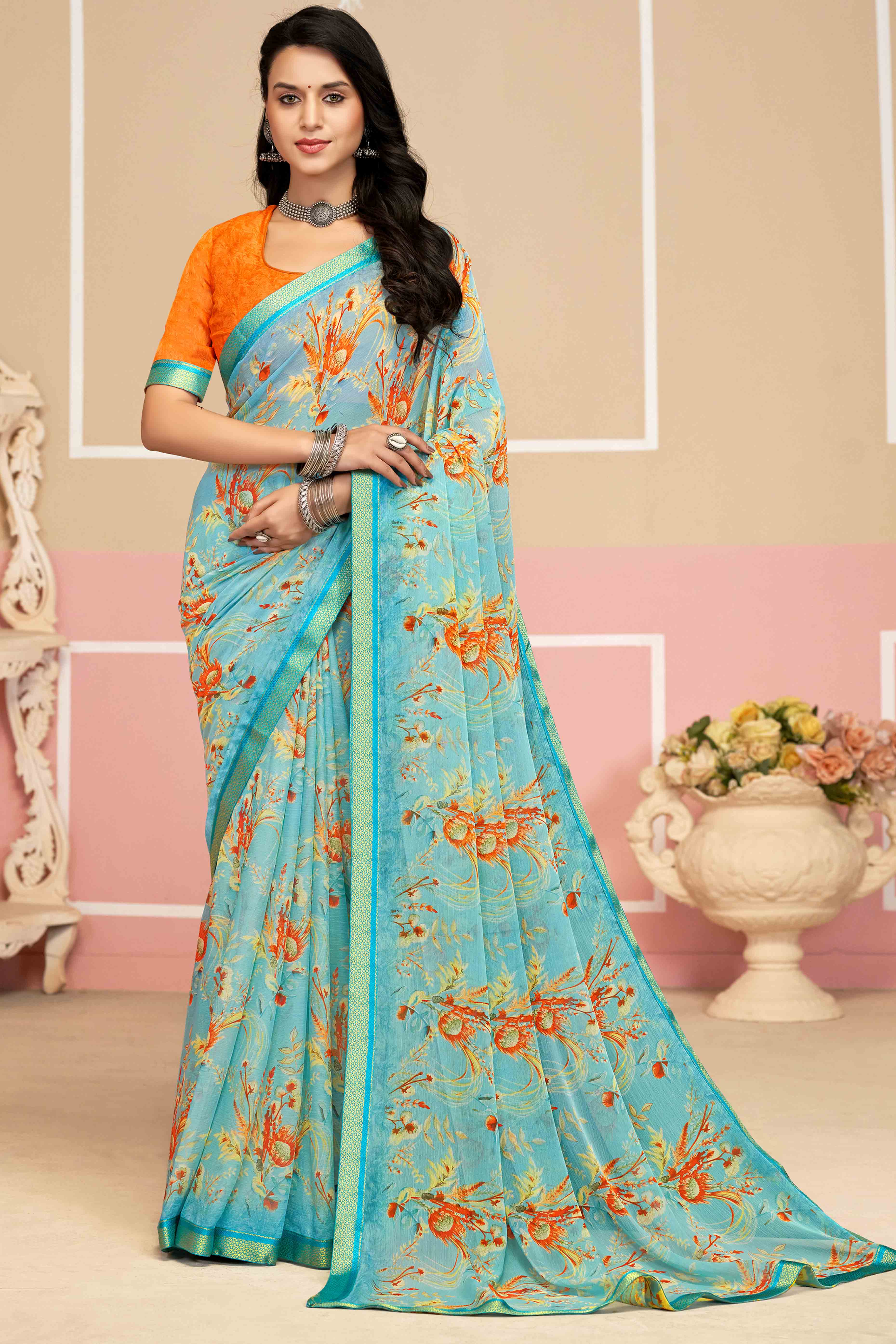 Dazzling Floral Printed Chiffon Saree In Sky Blue with Delicate Woven Lace Border