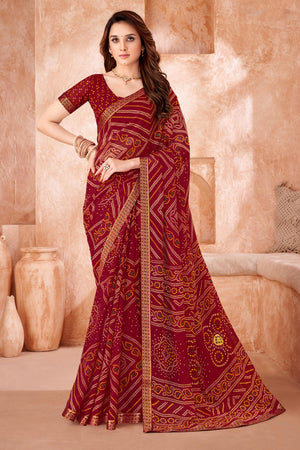 Maroon Chiffon Saree Featuring Traditional Bandhani Prints & A Graceful Lace Edge