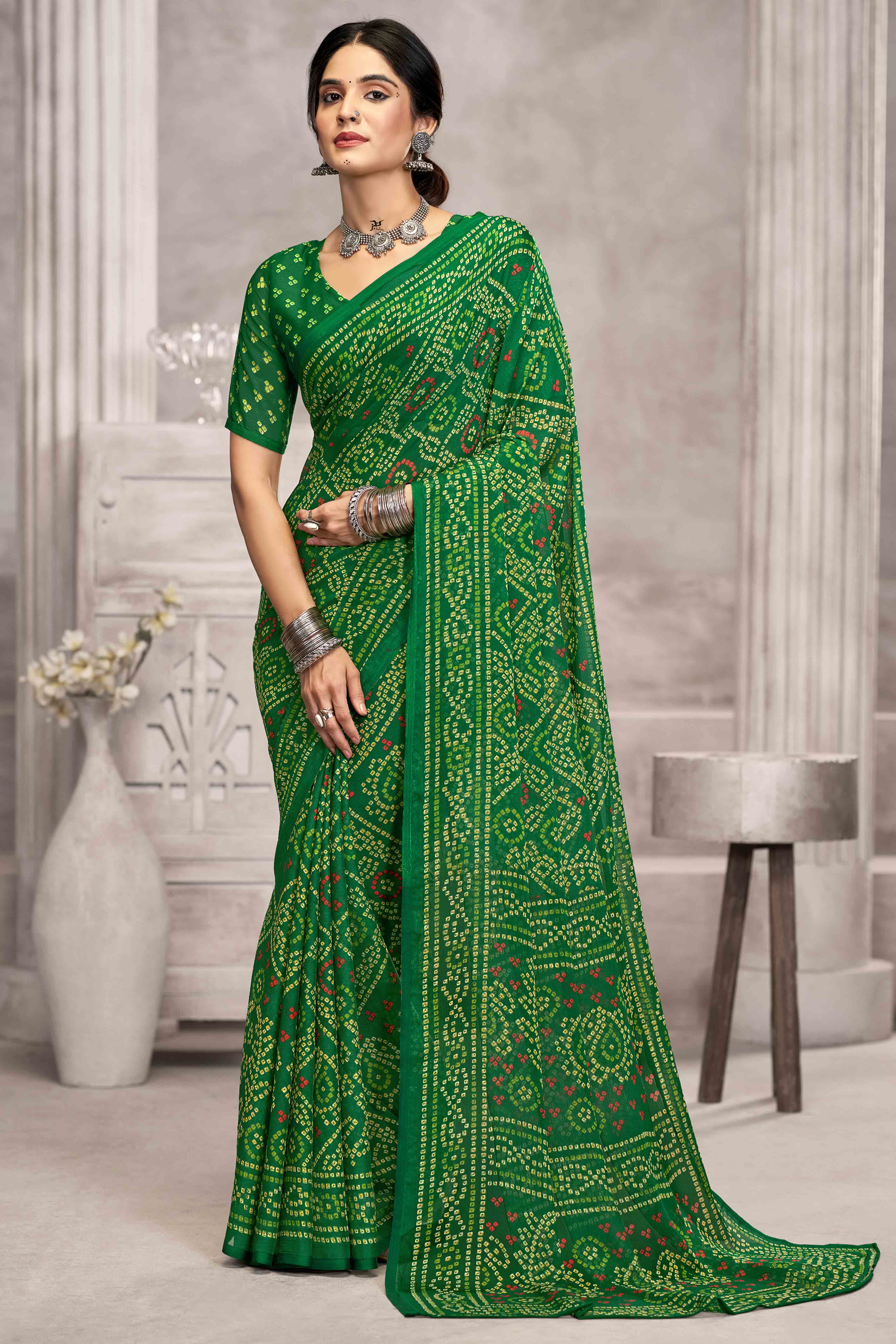 Green Chiffon Saree Features Bandhani Print for Casual Occasion